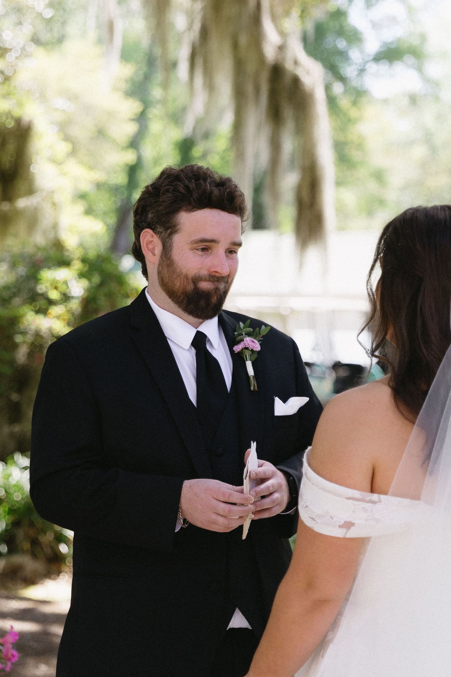 Bride and groom emotional first look at Wedgefield Country Club near Pawleys Island South Carolina wedding photography