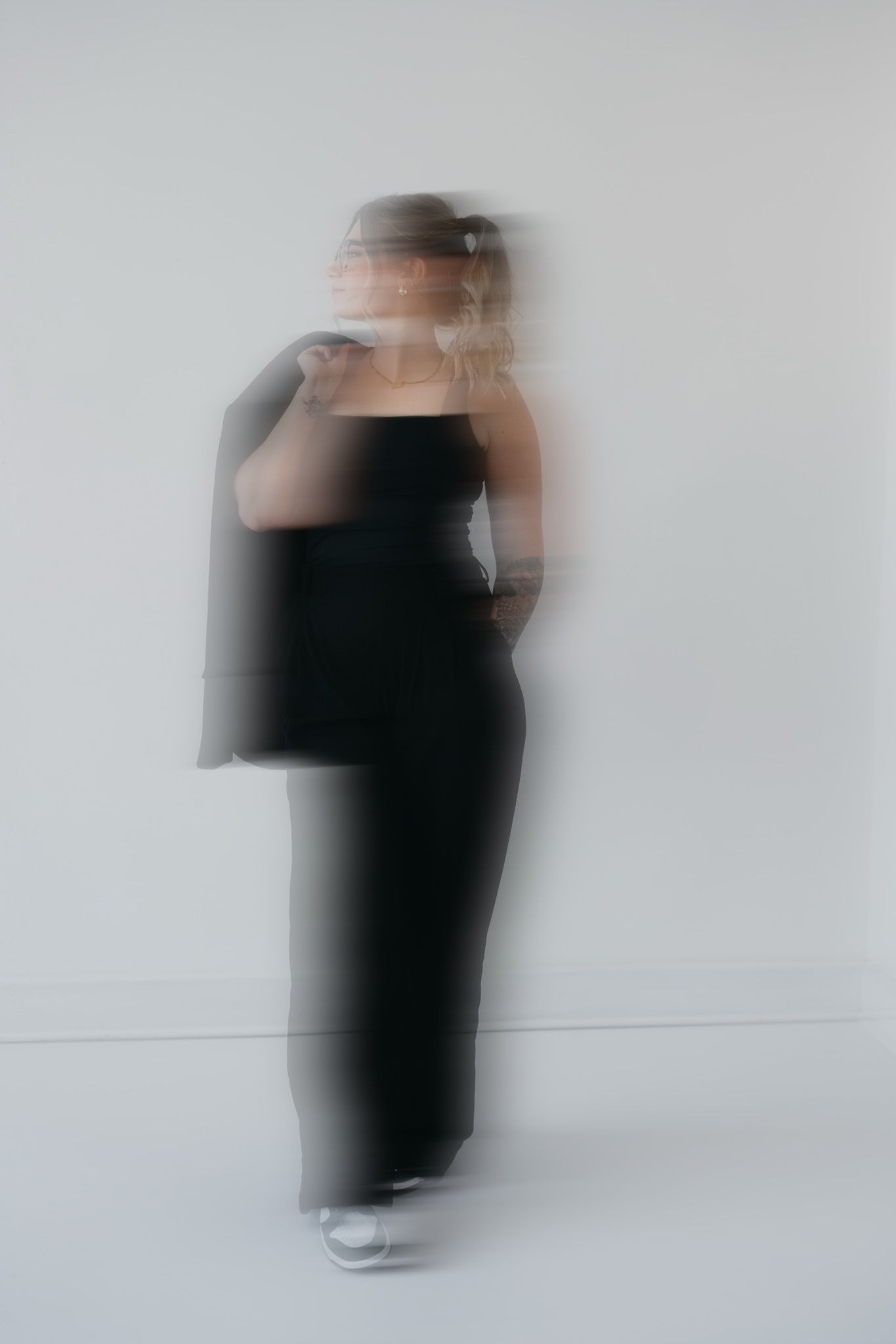 Abstract motion blur photography series in monochrome showing movement and form.