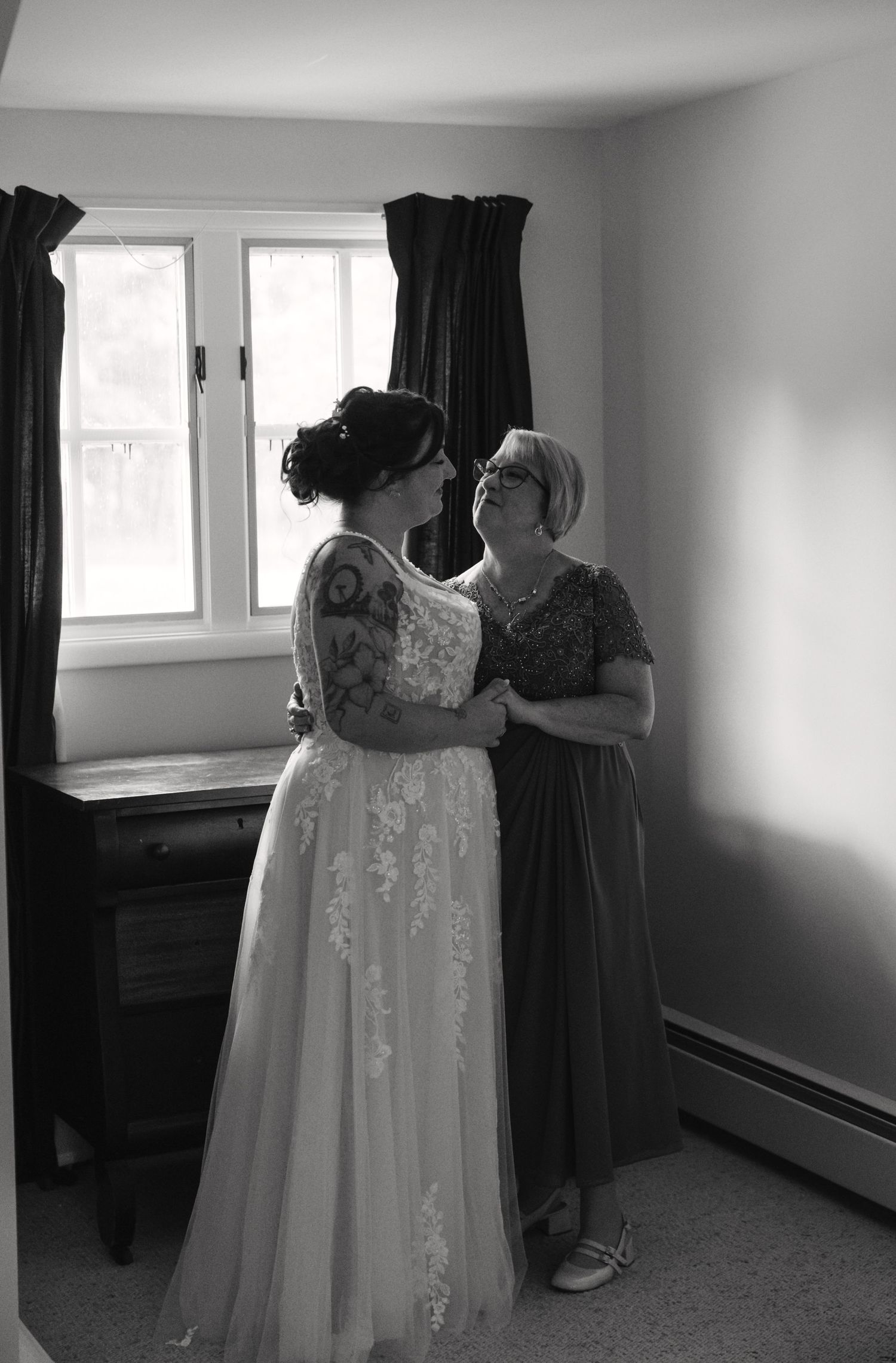 Getting ready moments captured in black and white as final wedding preparations are made.