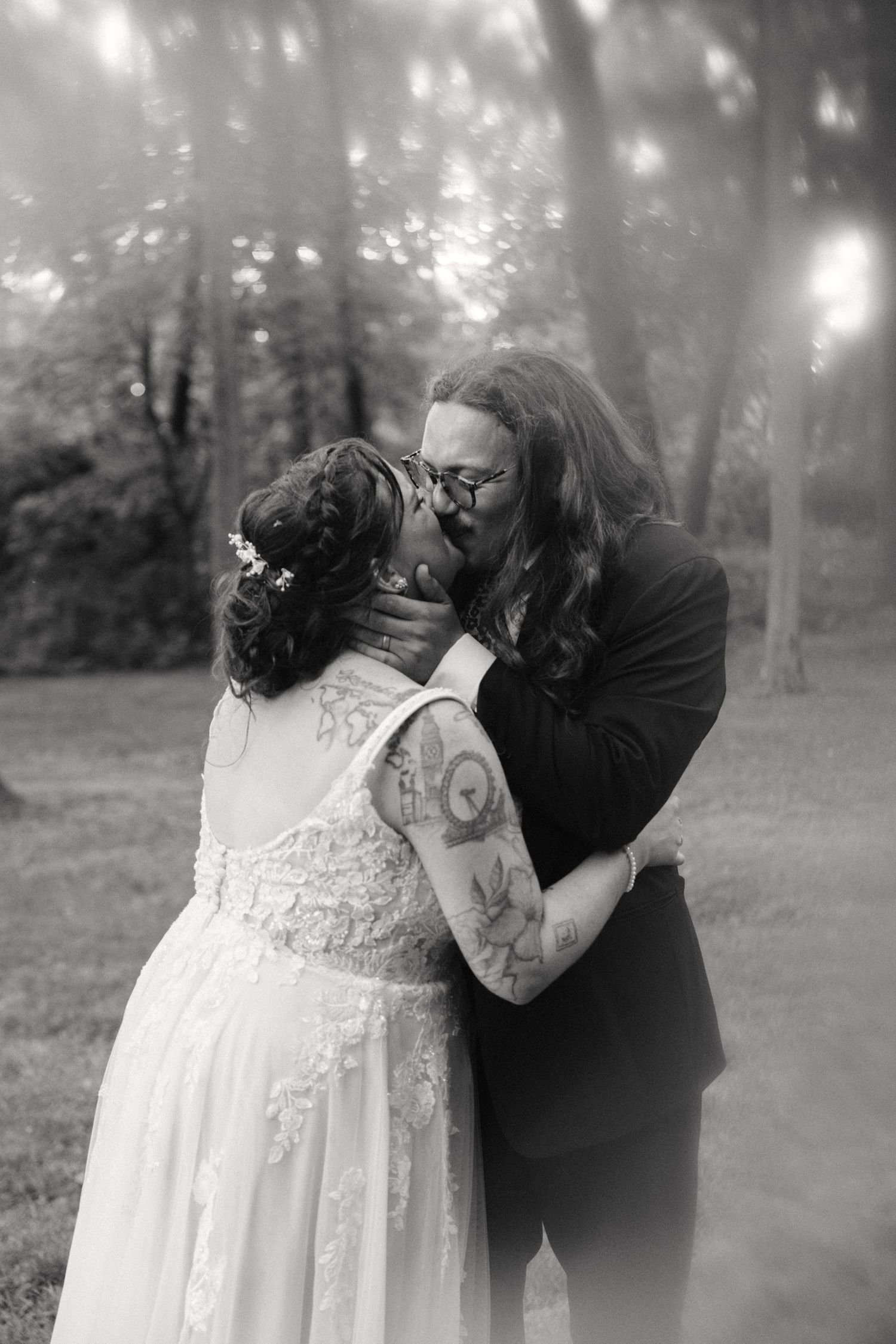Intimate black and white wedding portraits showing tender moments between the couple.