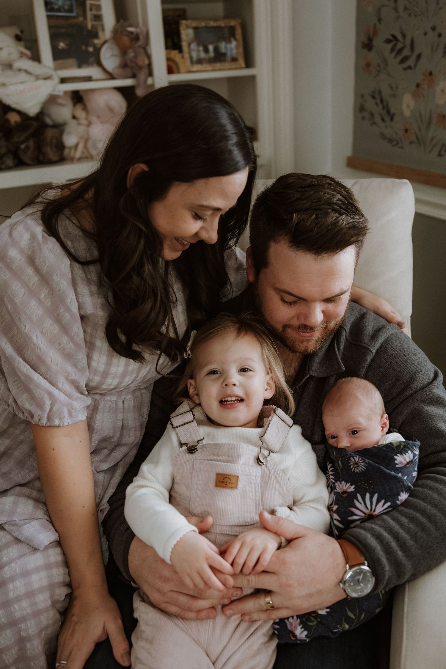 A tender family moment captured in a series of intimate photos showing parents bonding with their young children at home.