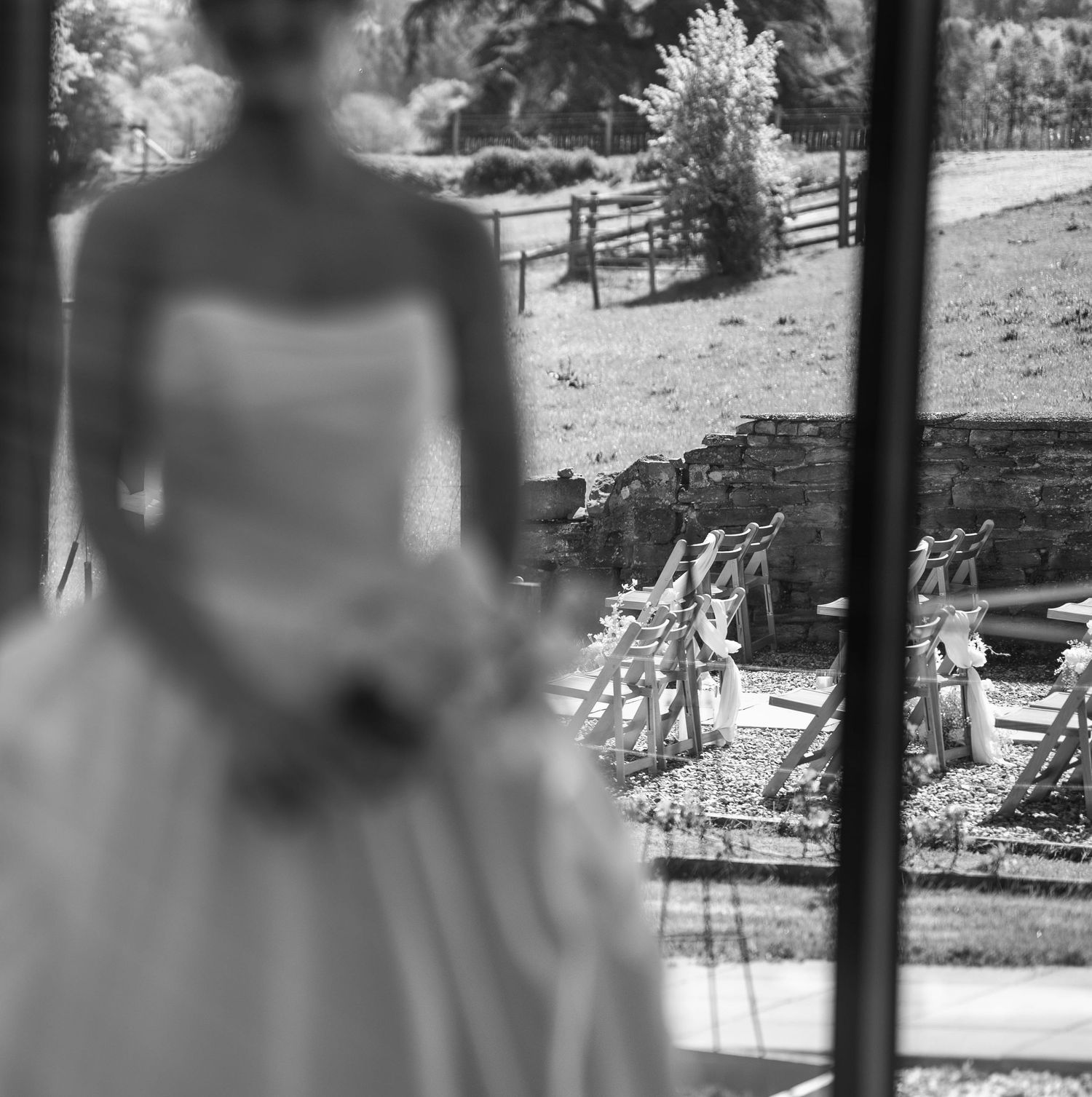 Wedding venue setup in the backgroundat a Hertfordshire wedding
