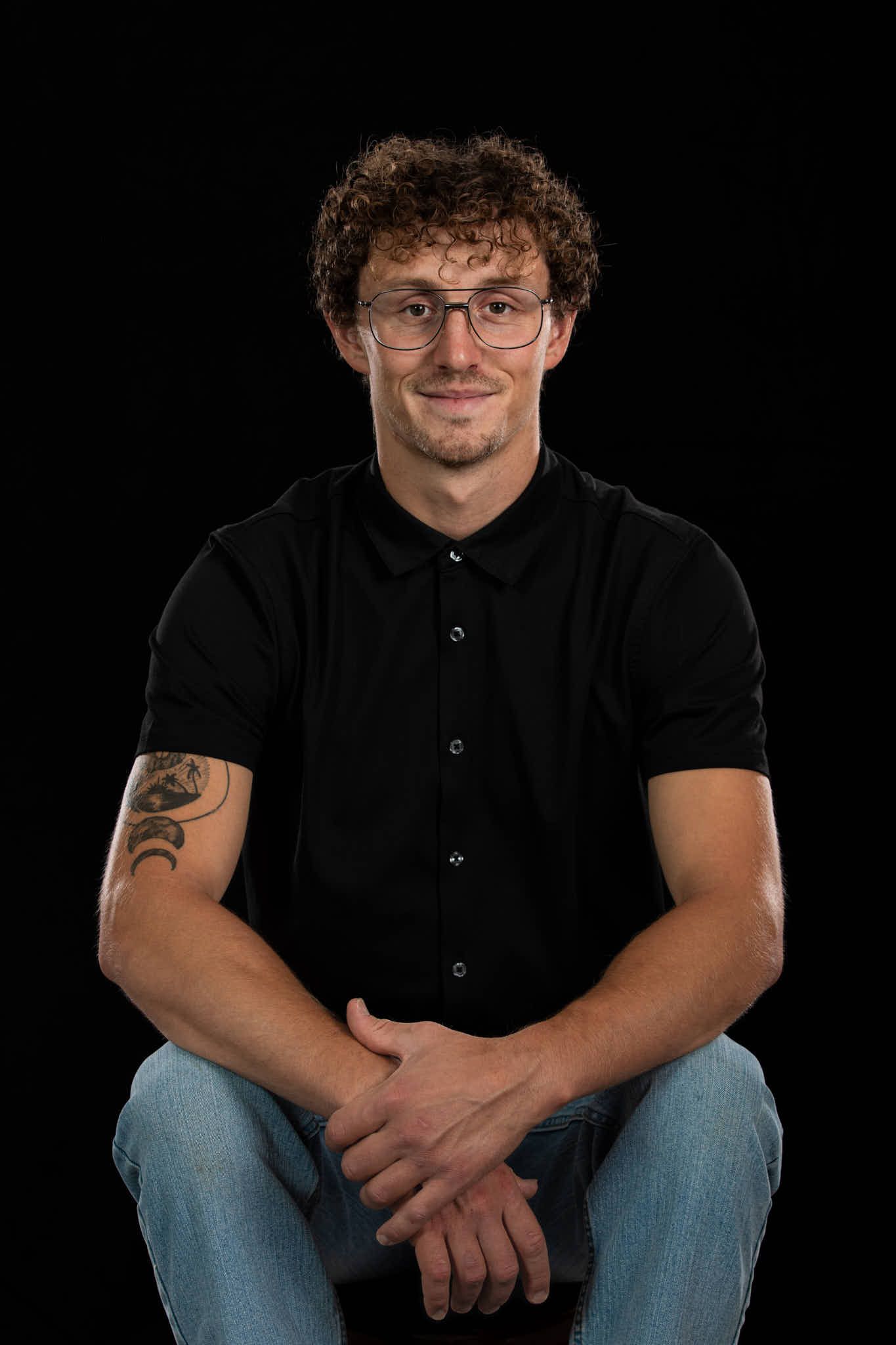 Mason Peters from West Bend, Wisconsin posing for professional headshots.