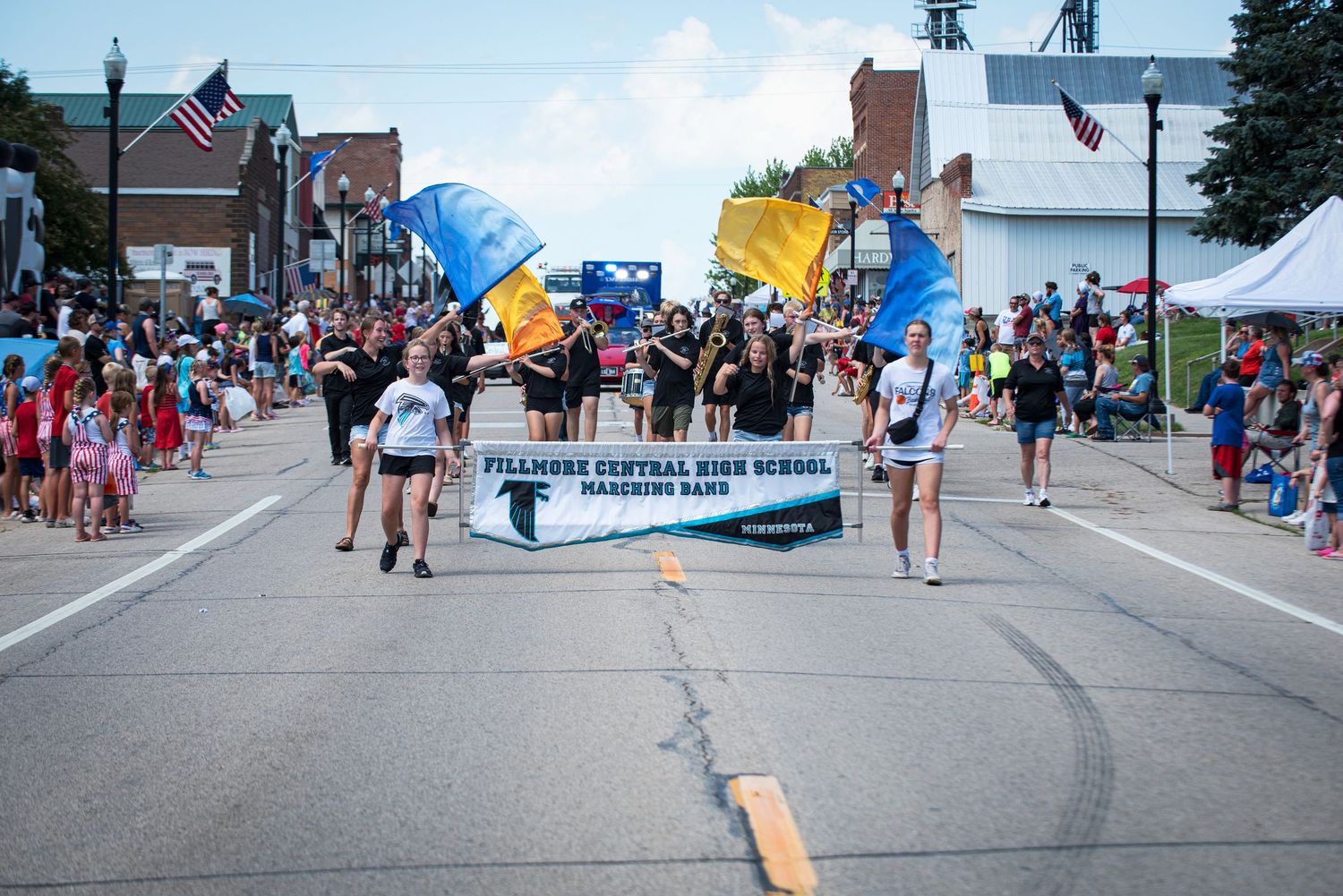 Fillmore Central High School Marching Band performs during a colorful small-town Fourth of July parade. At Harmony MN.