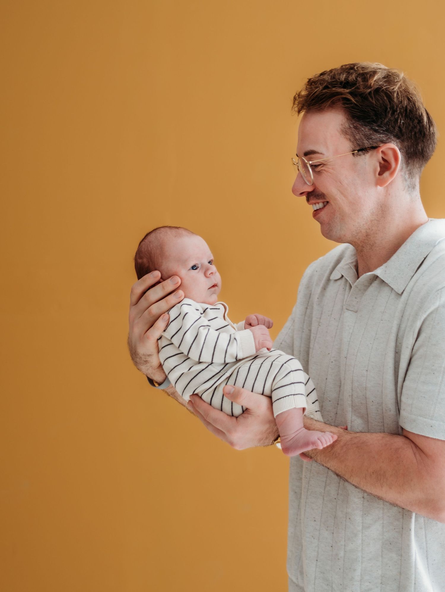 Denver family photographer candid studio session