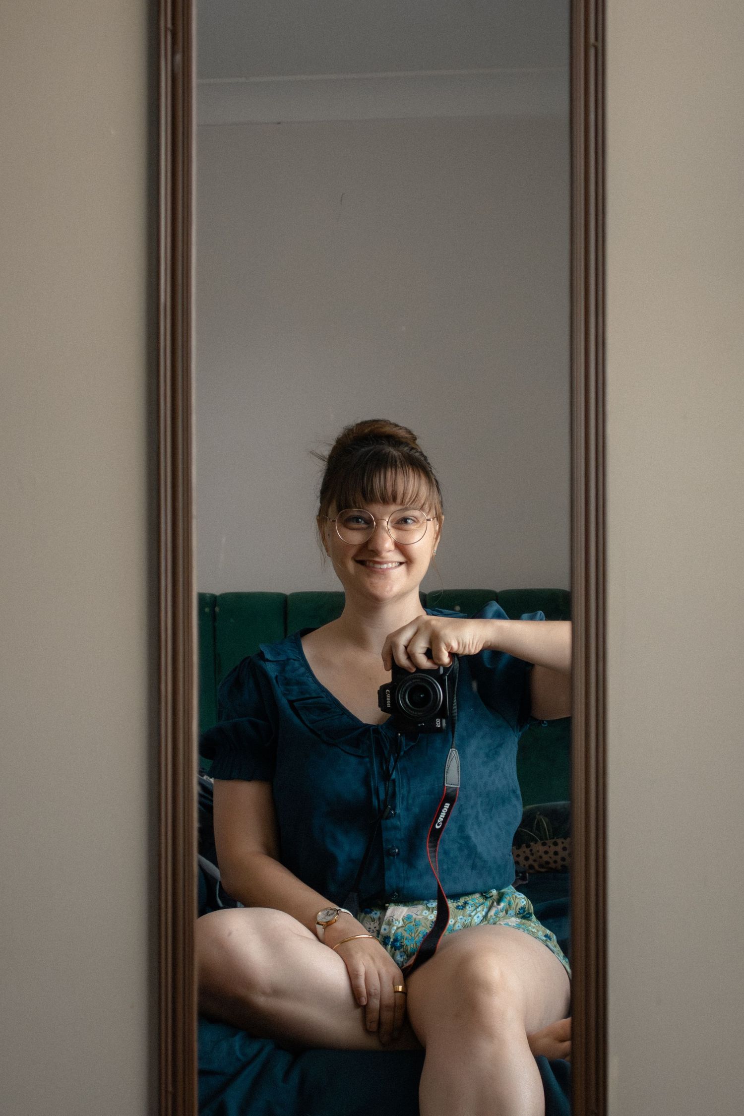 Self-portrait of Hunter Valley lifestyle and storytelling photographer captured in mirror with natural window light