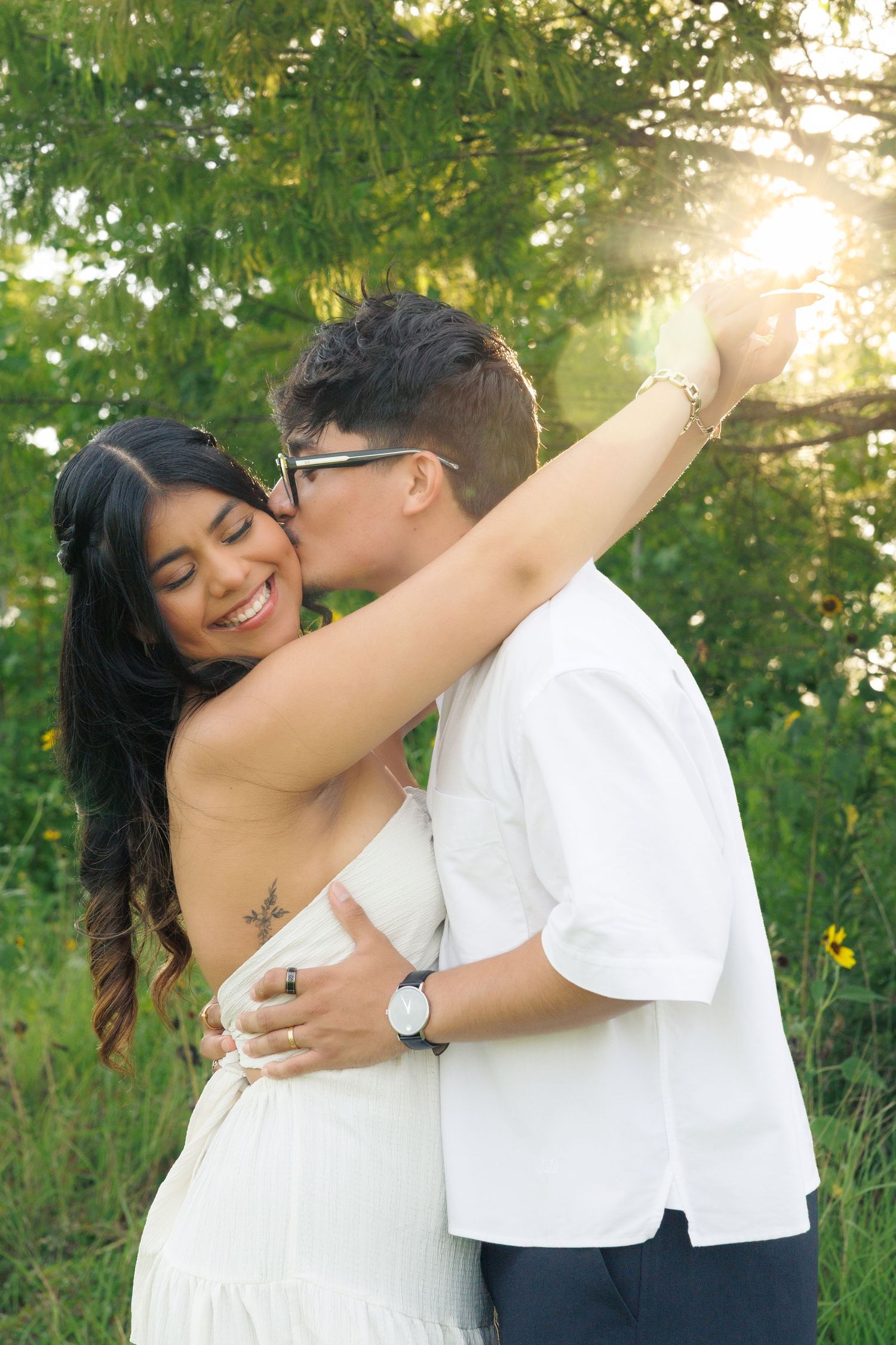 Couple at golden hour in Houston, Tx enjoying a sweet moment