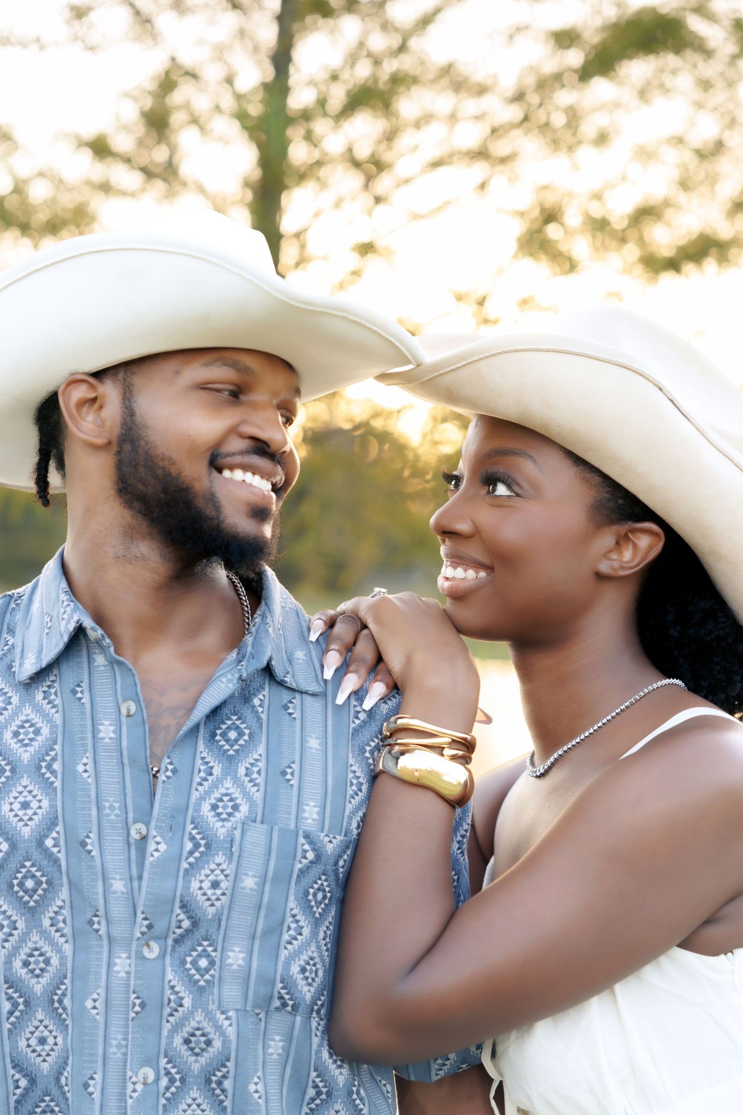 Couple at golden hour in Houston, Tx enjoying a sweet moment