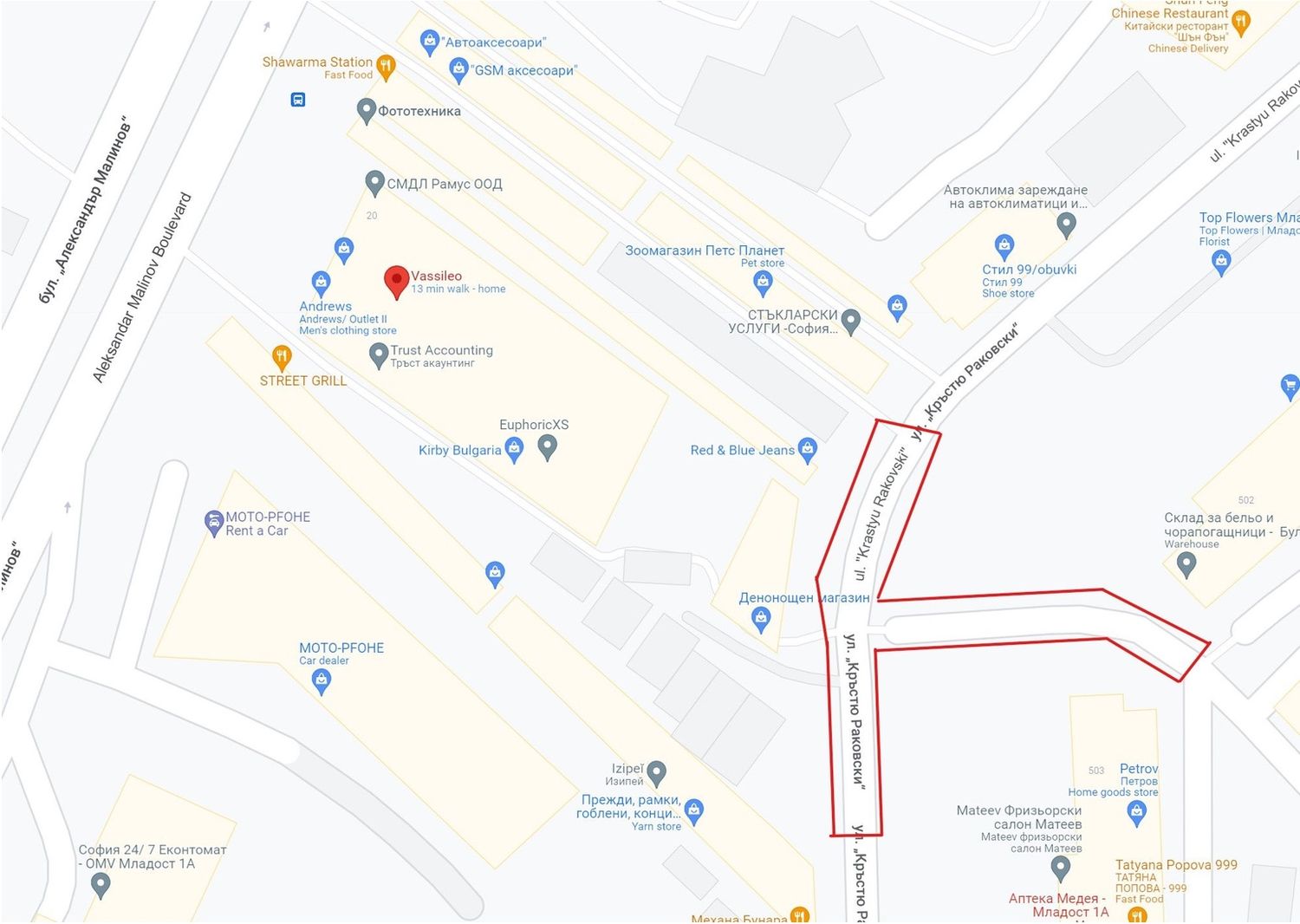 Map with a red pin and red outlined streets marking the location of a photo studio in the city center.