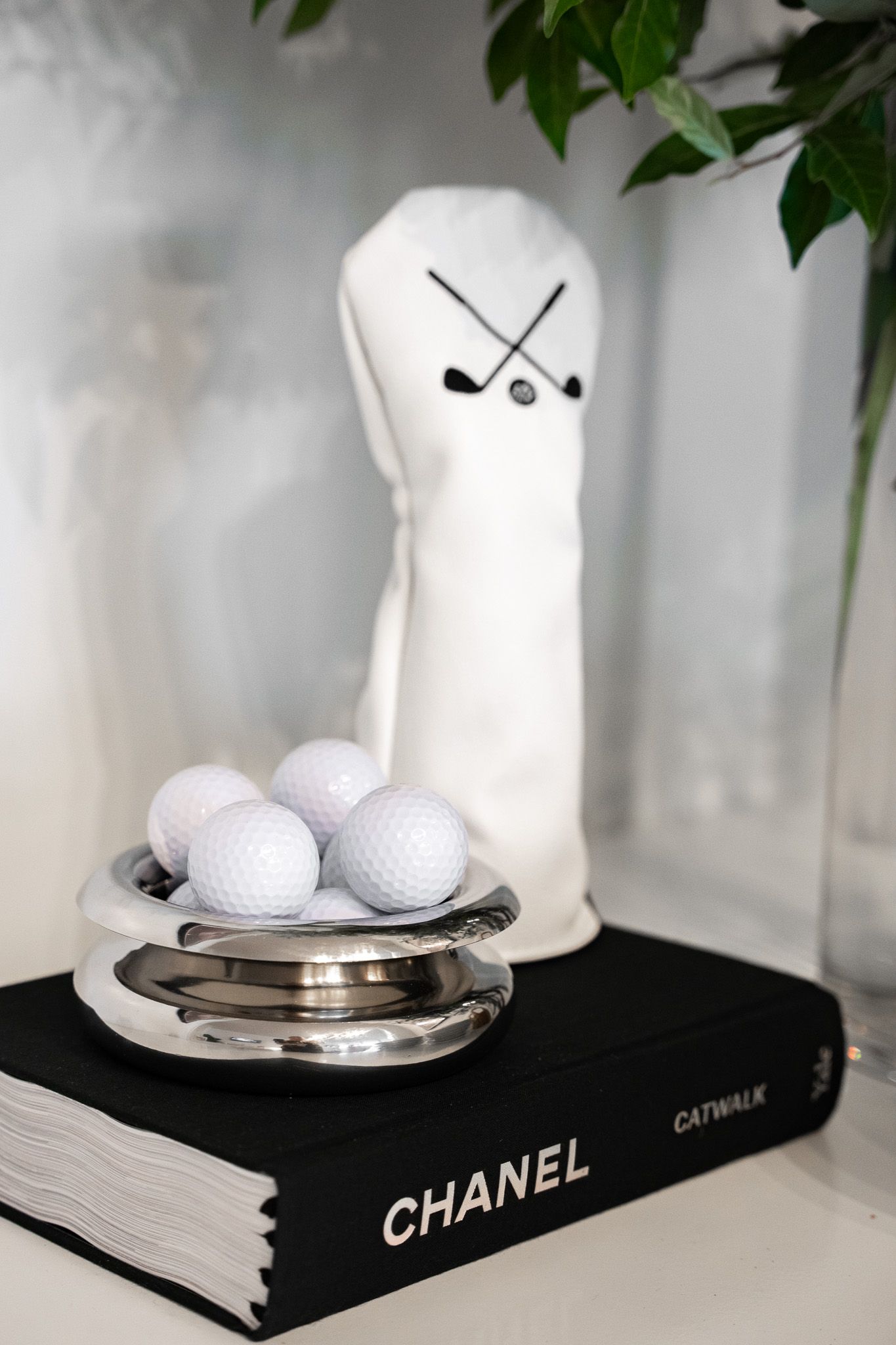 Corporate event photography of a company suite at the U.S. Open Golf Championship in the Hamptons, NY featuring Chanel merchandise