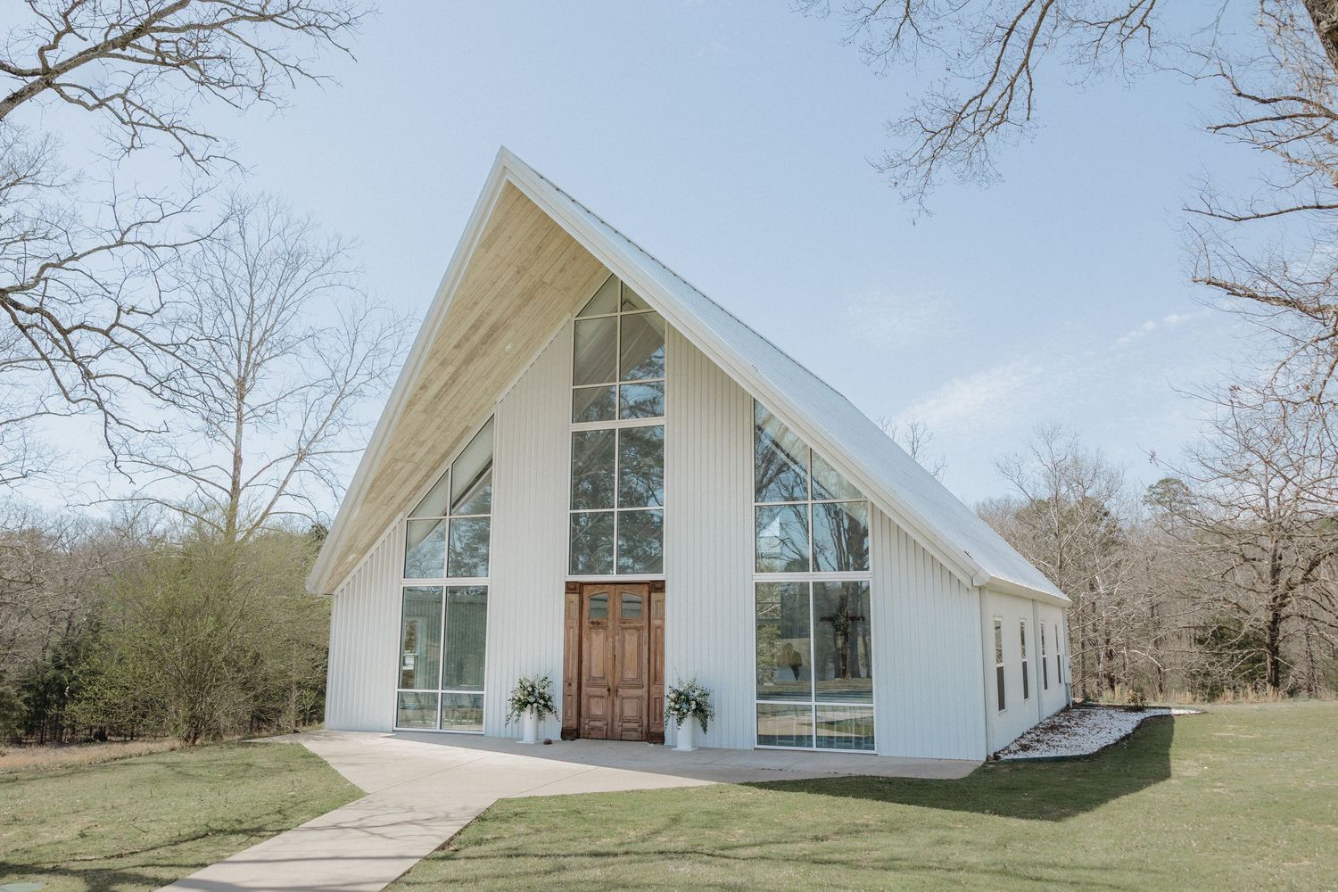 White glass chapel at Cold Springs Events wedding venue in Paron Arkansas