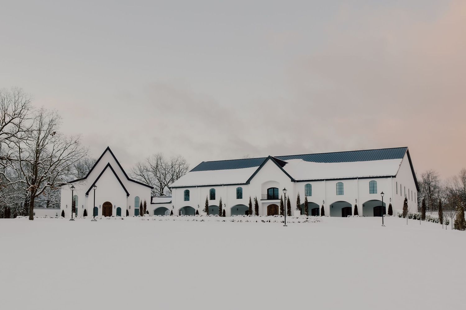 The Grand at Willow Springs wedding venue located in Prairie Grove Arkansas on a snowy day photographed by Malachi Westbrook Photography.