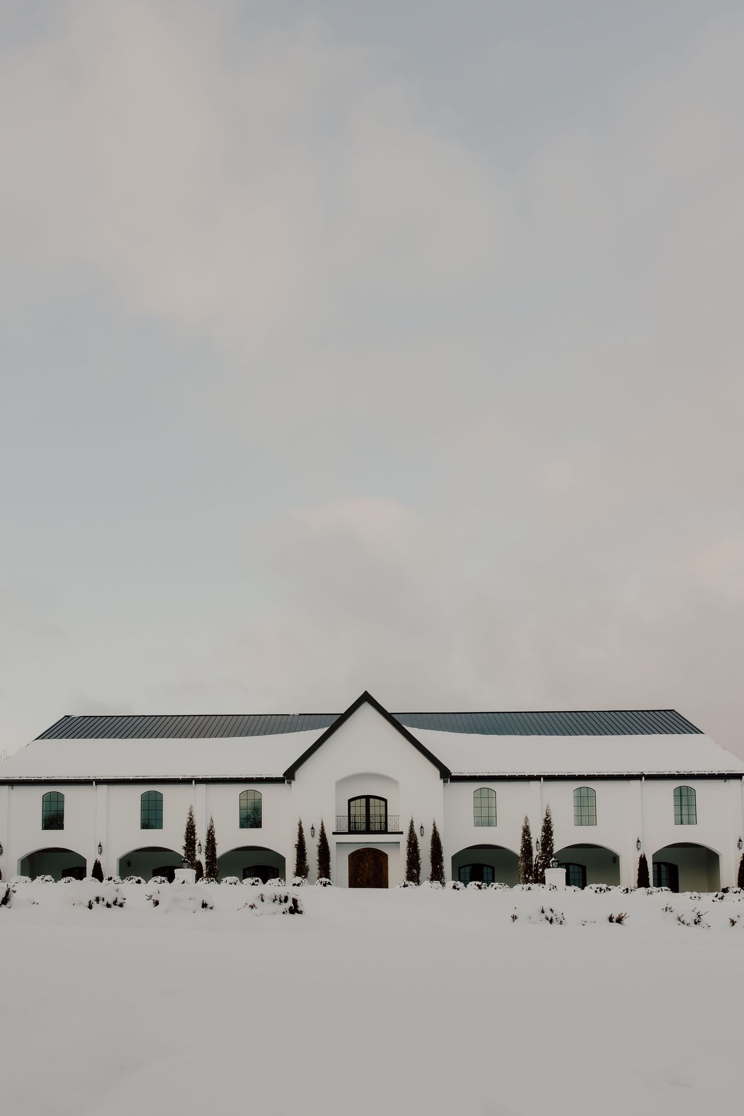 The Grand at Willow Springs wedding venue located in Prairie Grove Arkansas on a snowy day photographed by Malachi Westbrook Photography.