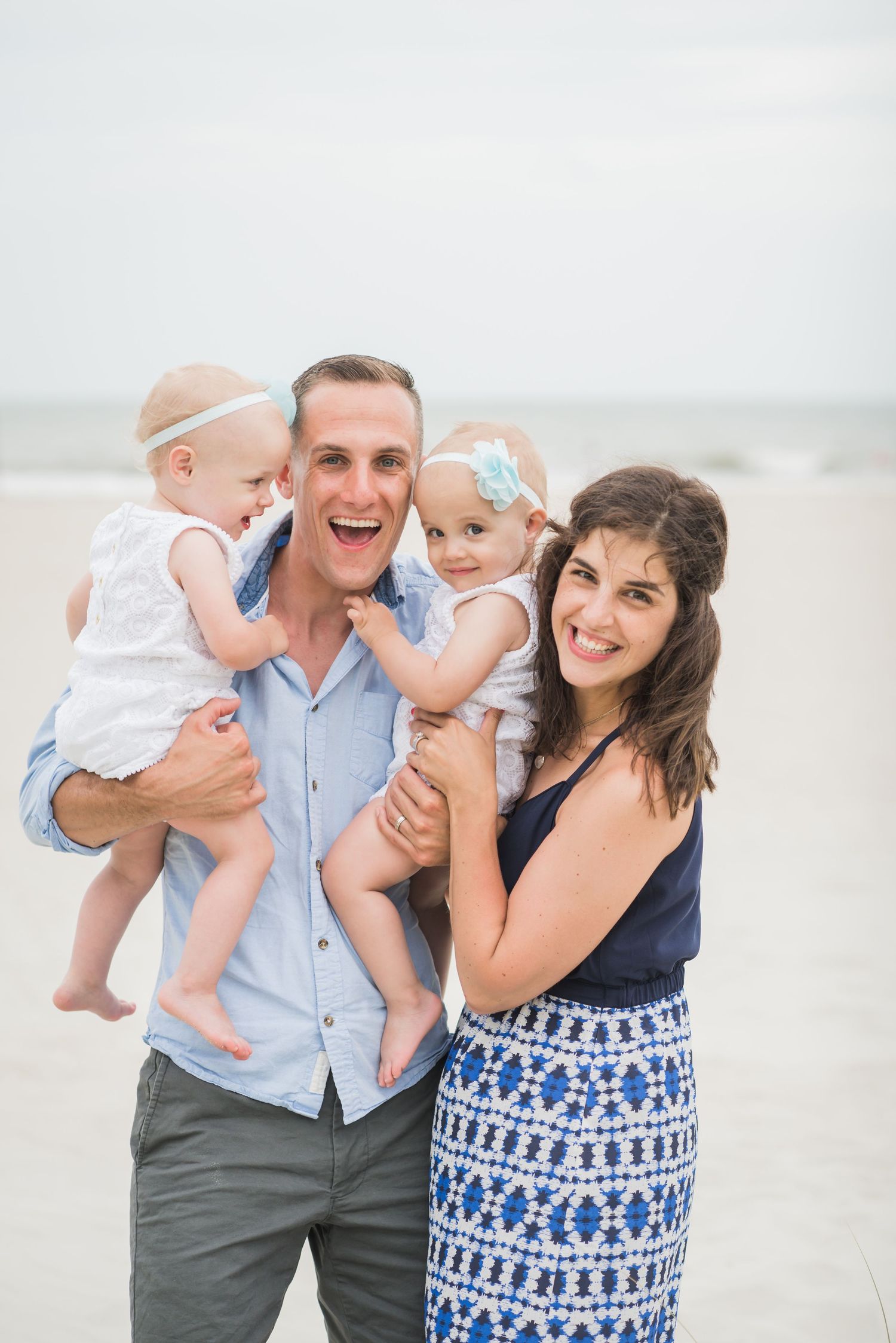 Family portrait series at beach showing joyful moments with  casual summer attire. St. Augustine Beach, Hammock Beach photographer.