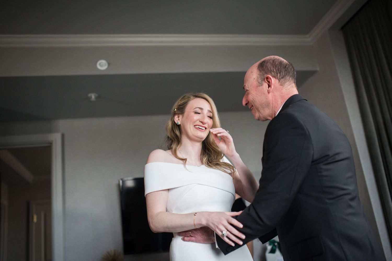 Intimate wedding moments captured in a series of black and white photographs.