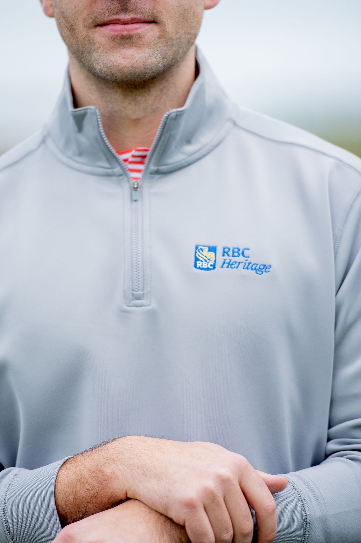 Close-up of grey RBC Heritage quarter-zip golf pullover detail. Sea Pines Hilton Head. Southern Tide Brand editorial photoshoot.