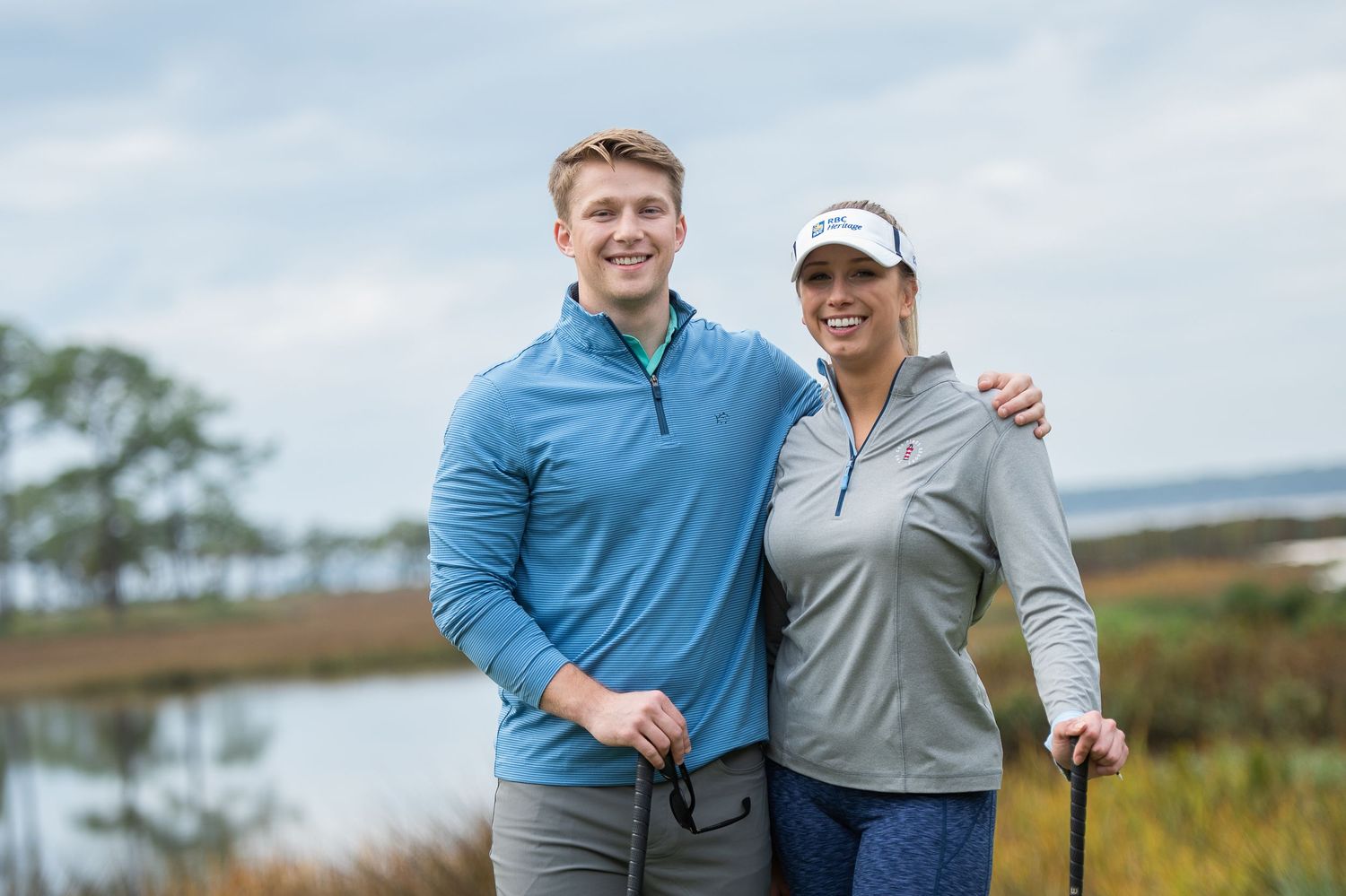 Golfers pose together on scenic golf course with marsh and pine trees in background. Sea Pines Hilton Head. Southern Tide Brand editorial ph
