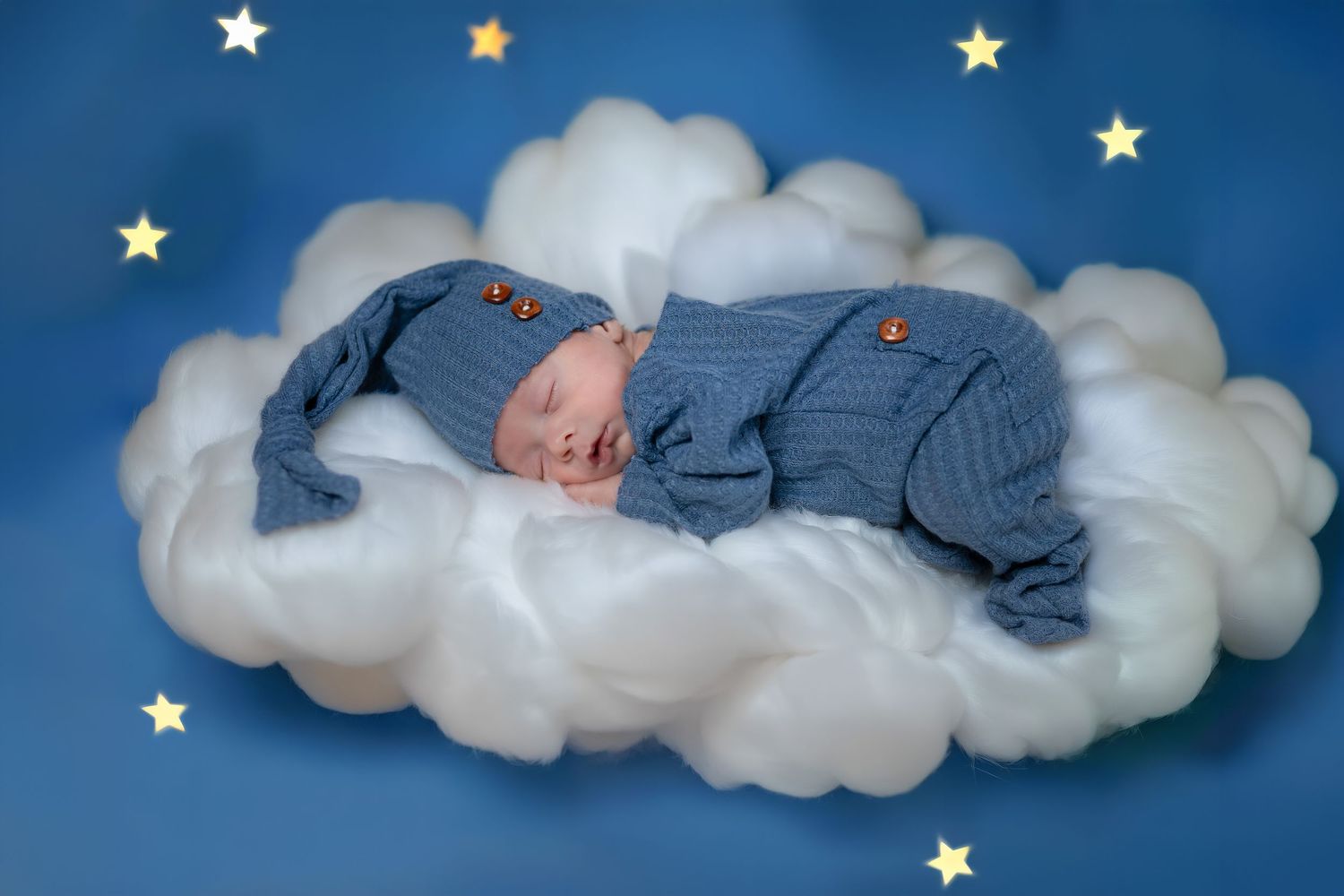newborn on a cloud during newborn session in Havelock Ontario | Yesterday's Focus
