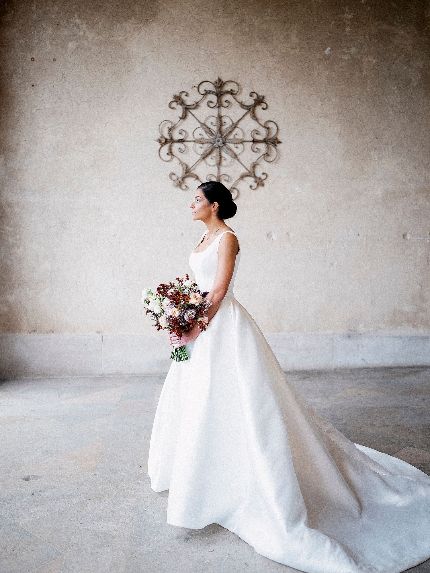 Elegant bridal portraits showing a white ballgown wedding dress against a minimalist backdrop. NYC wedding photographer.