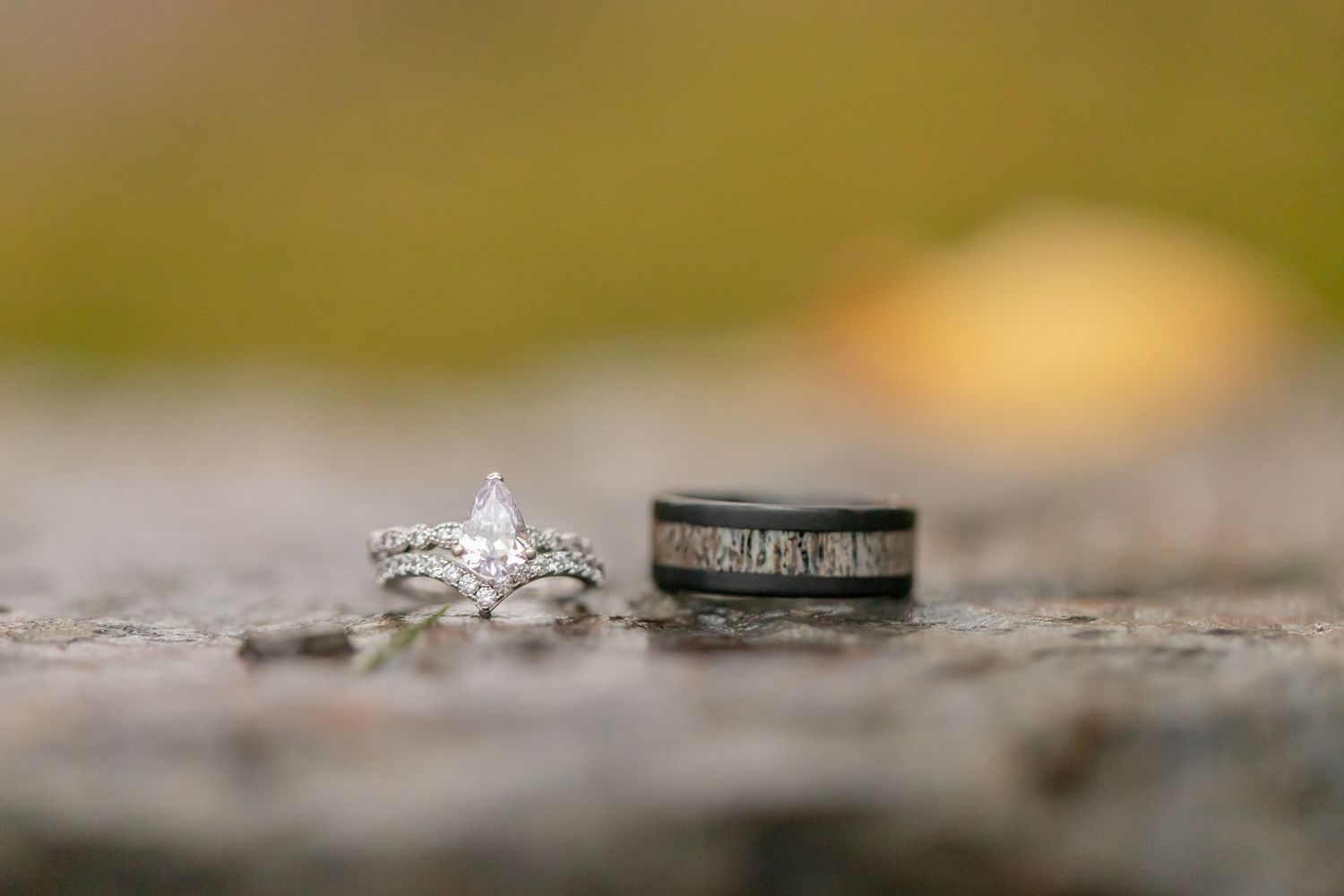 Close-up macro shot of wedding rings with bokeh background. shot by lake havasu wedding photographer arianna hosea