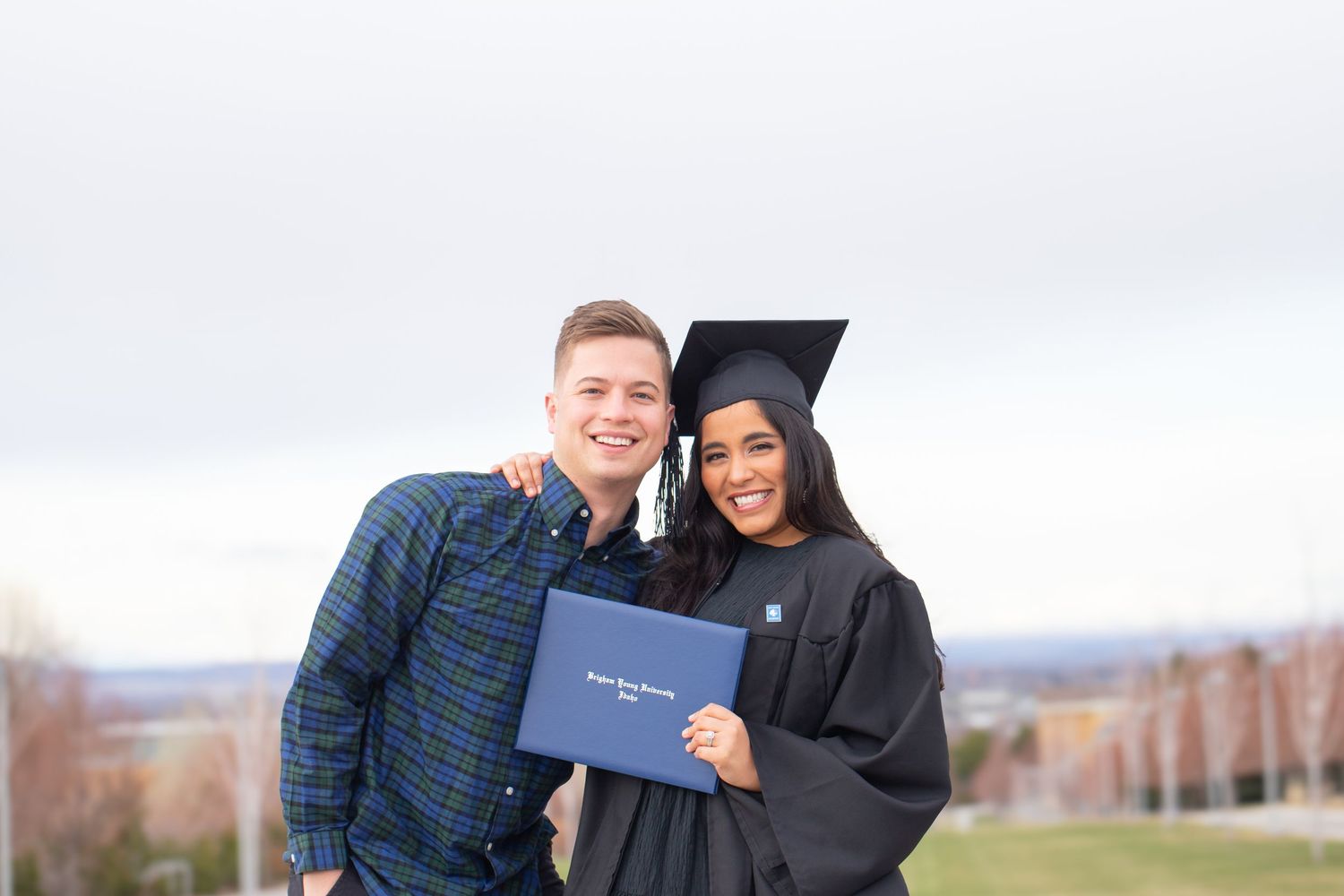 Graduation celebration photos with diplomas against white background.