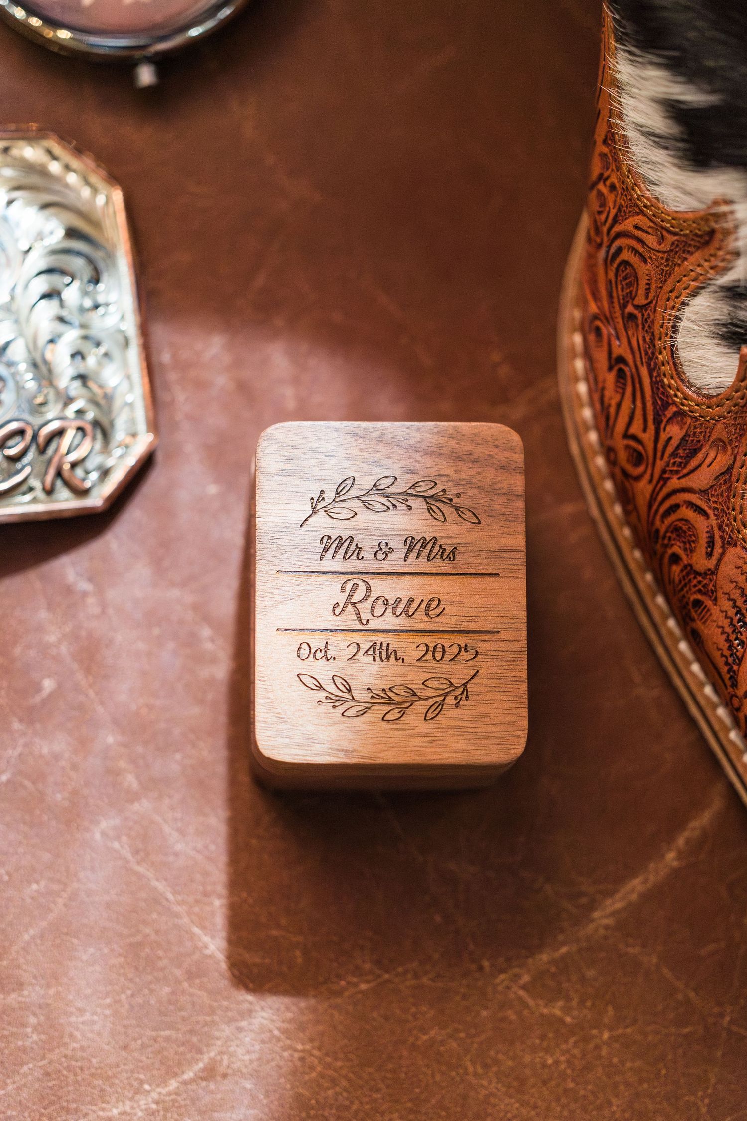 Wooden wine corks with engraved wedding details and date at iron wolf lake havasu