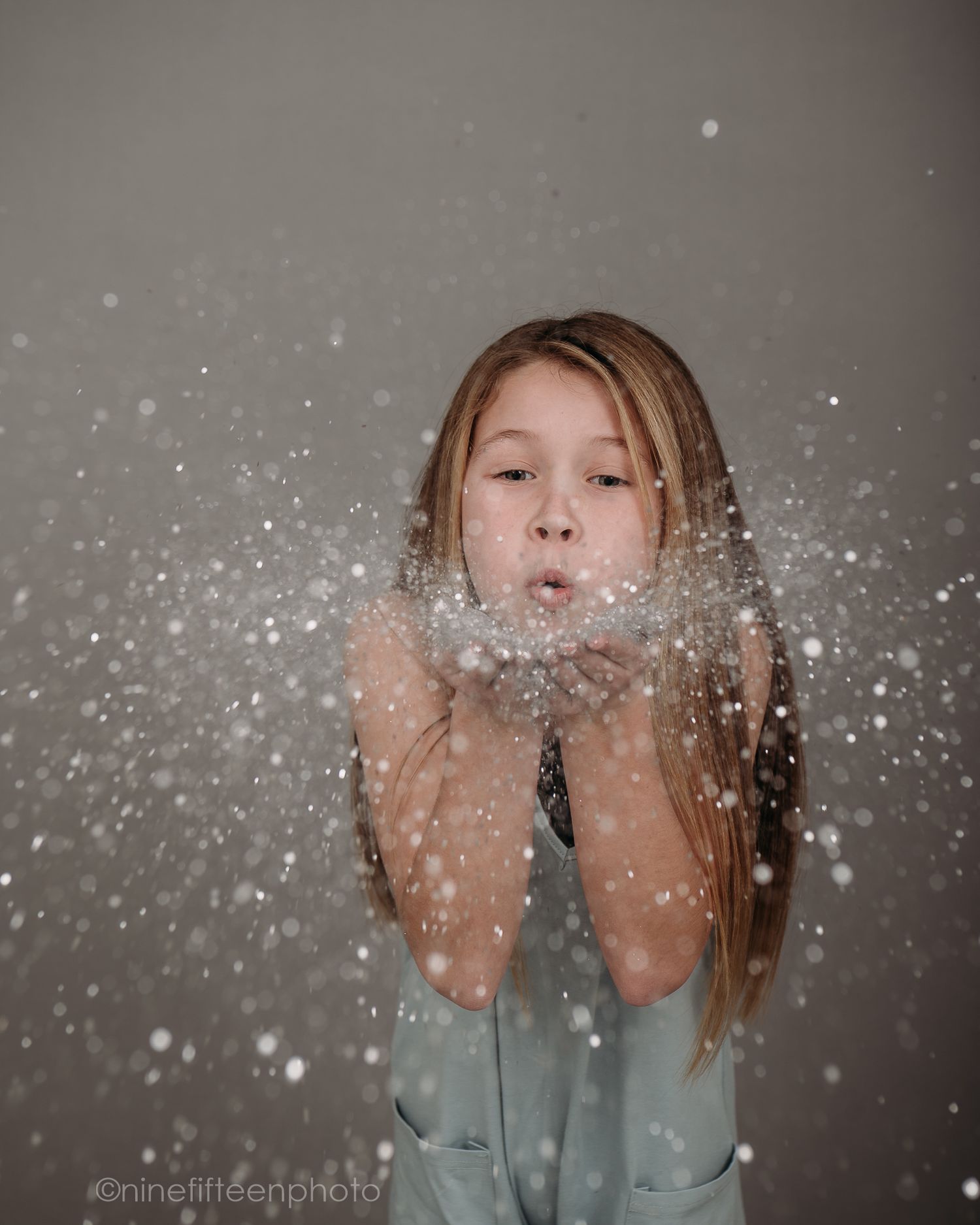 Fine art child portrait with glitter or snow effect in studio, Kentucky children photographer in Meade County.