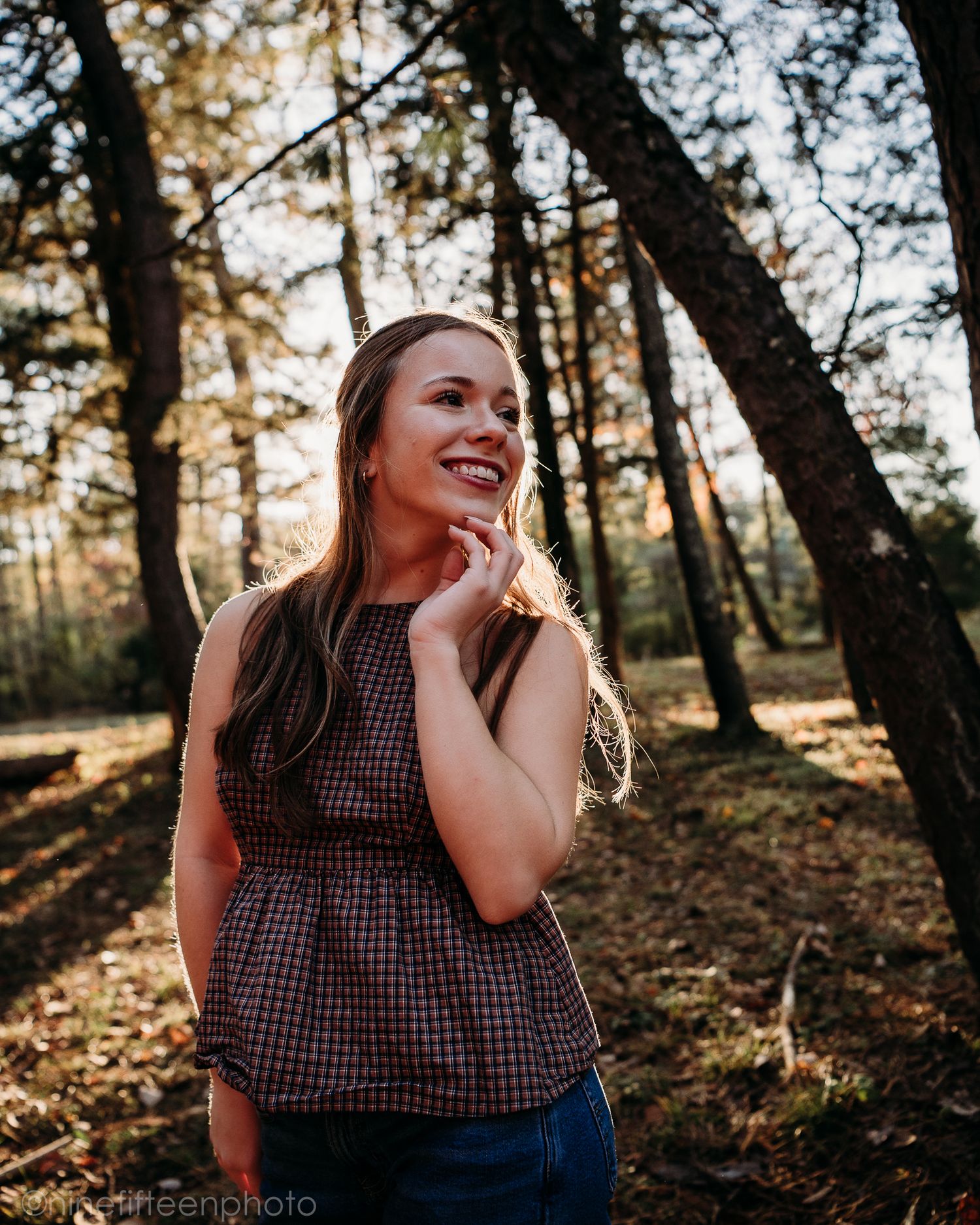 Fall senior photos of a high school girl captured by ninefifteenphoto in Brandenburg KY, featuring golden light, colorful leaves.