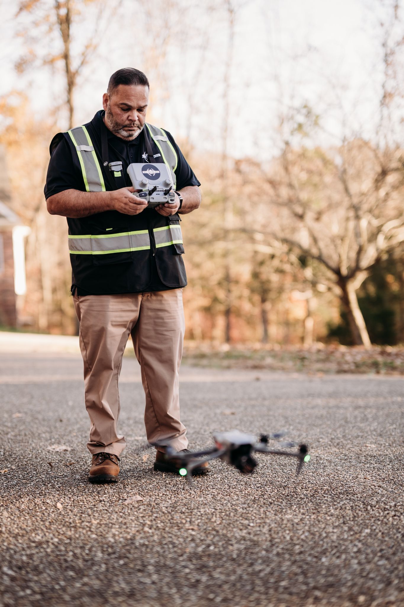 Brandenburg KY drone branding photos of José Maldonado, owner of Mal-Drone-Ado, captured by ninefifteenphoto during a real estate shoot in D