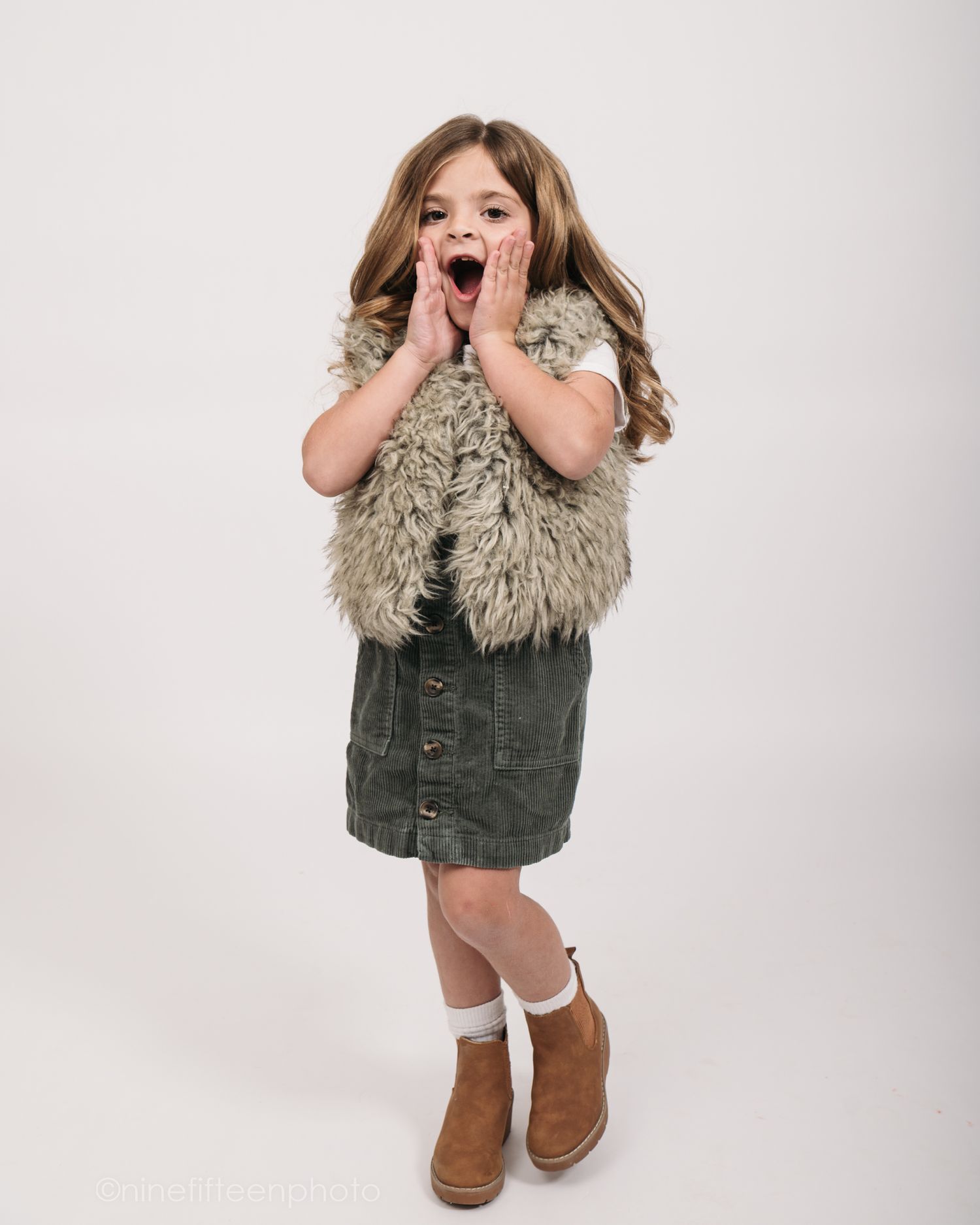 Minimalist collage of studio personality portraits designed as a white background phone wallpaper featuring a child photography session