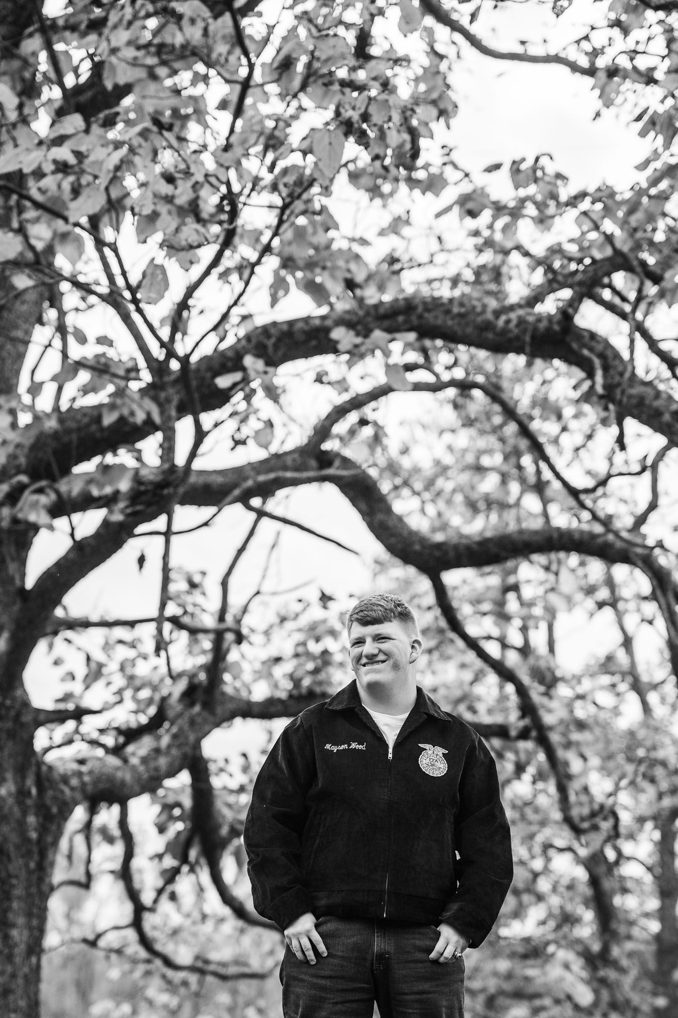 Black and white portrait of Mayson wearing his FFA jacket in Brandenburg Kentucky