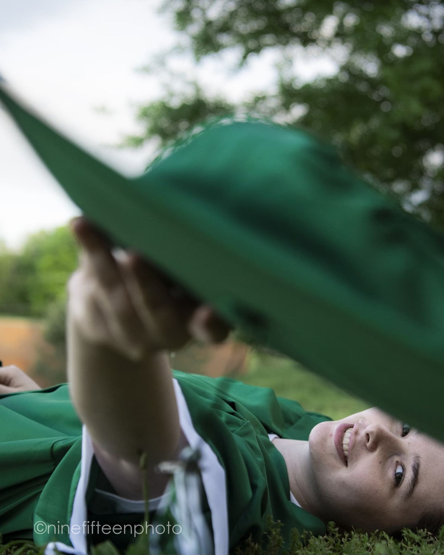 Senior graduation photo in cap and gown taken outdoors in Kentucky by ninefifteenphoto for Class of 2025.
