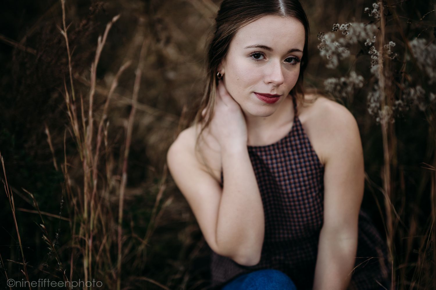 Fall senior photos of a high school girl captured by ninefifteenphoto in Brandenburg KY, featuring golden light, colorful leaves.