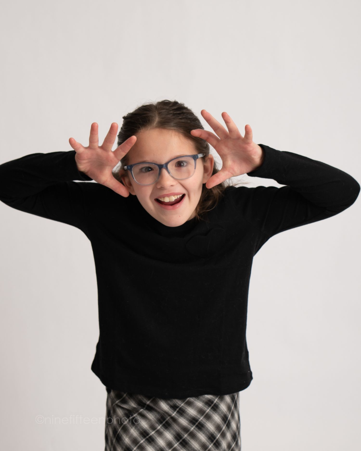 Studio kids portrait with silly expression on white background, ninefifteenphoto Meade County KY children photographer.