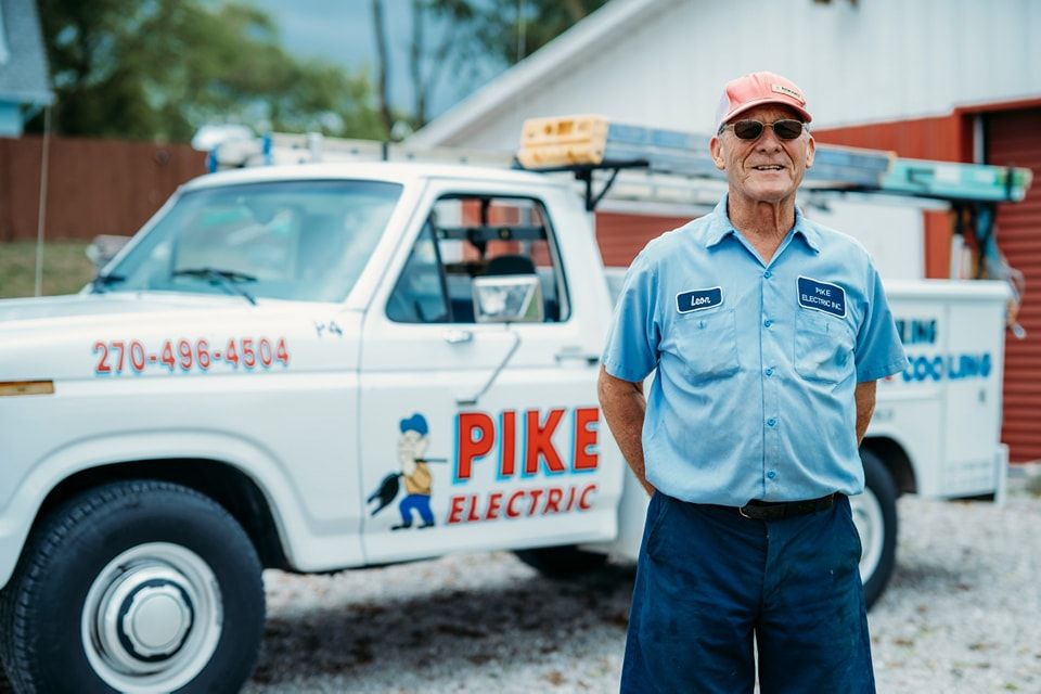 Portrait of electrician in front of service truck, ninefifteenphoto Brandenburg KY small business photographer in Meade County.