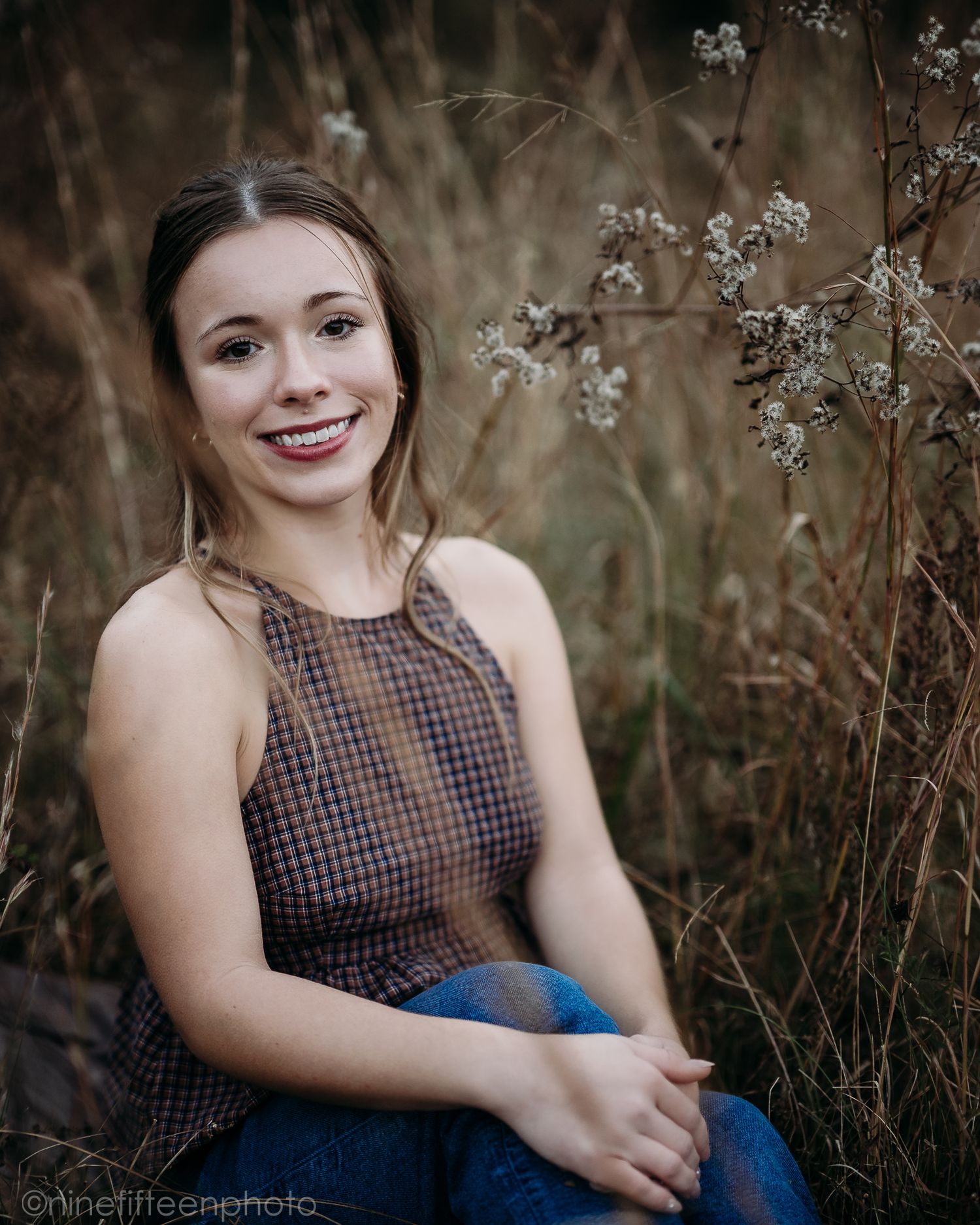 Fall senior photos of a high school girl captured by ninefifteenphoto in Brandenburg KY, featuring golden light, colorful leaves.
