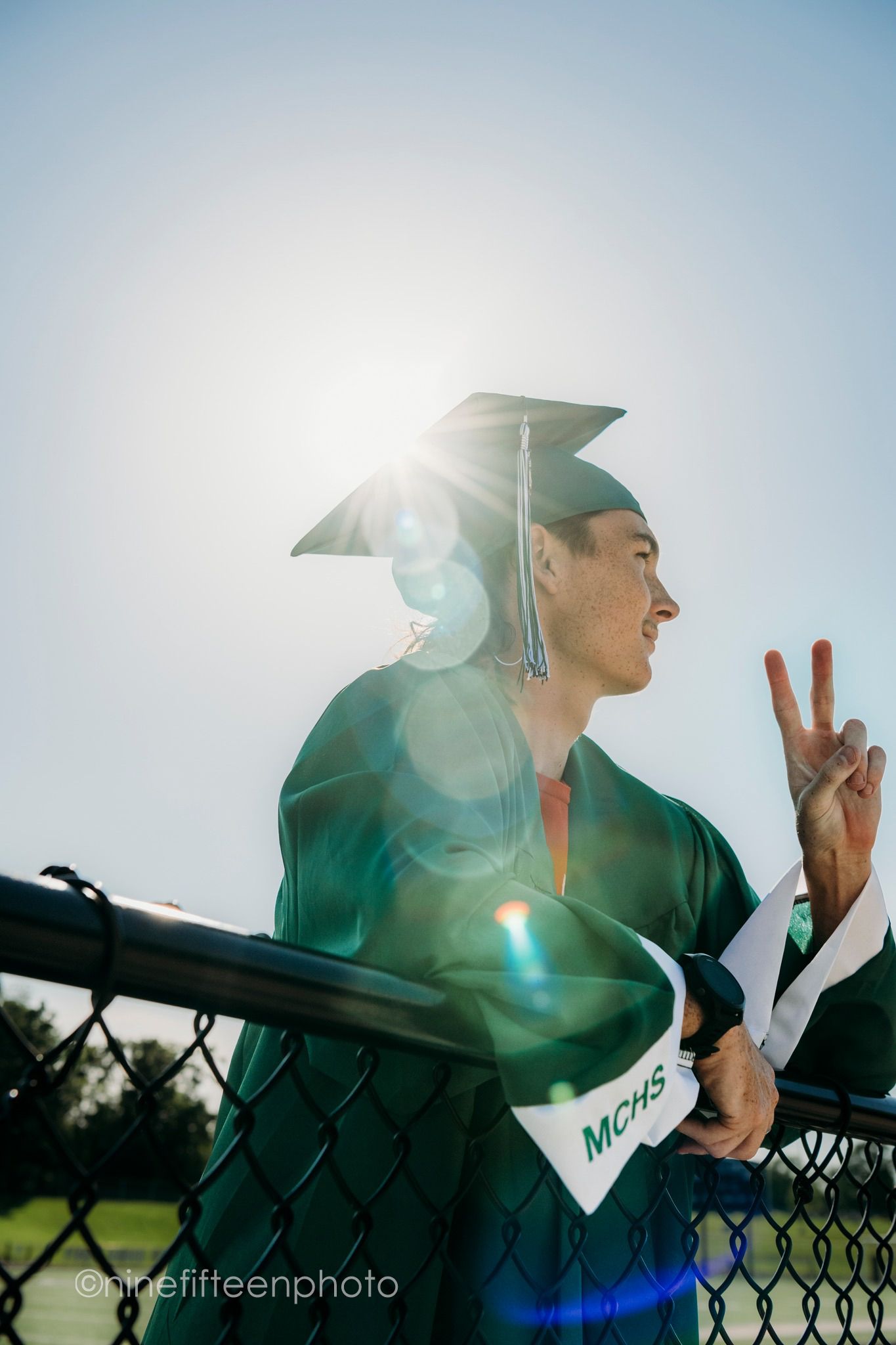 Senior graduation photo in cap and gown taken outdoors in Kentucky by ninefifteenphoto for Class of 2025.