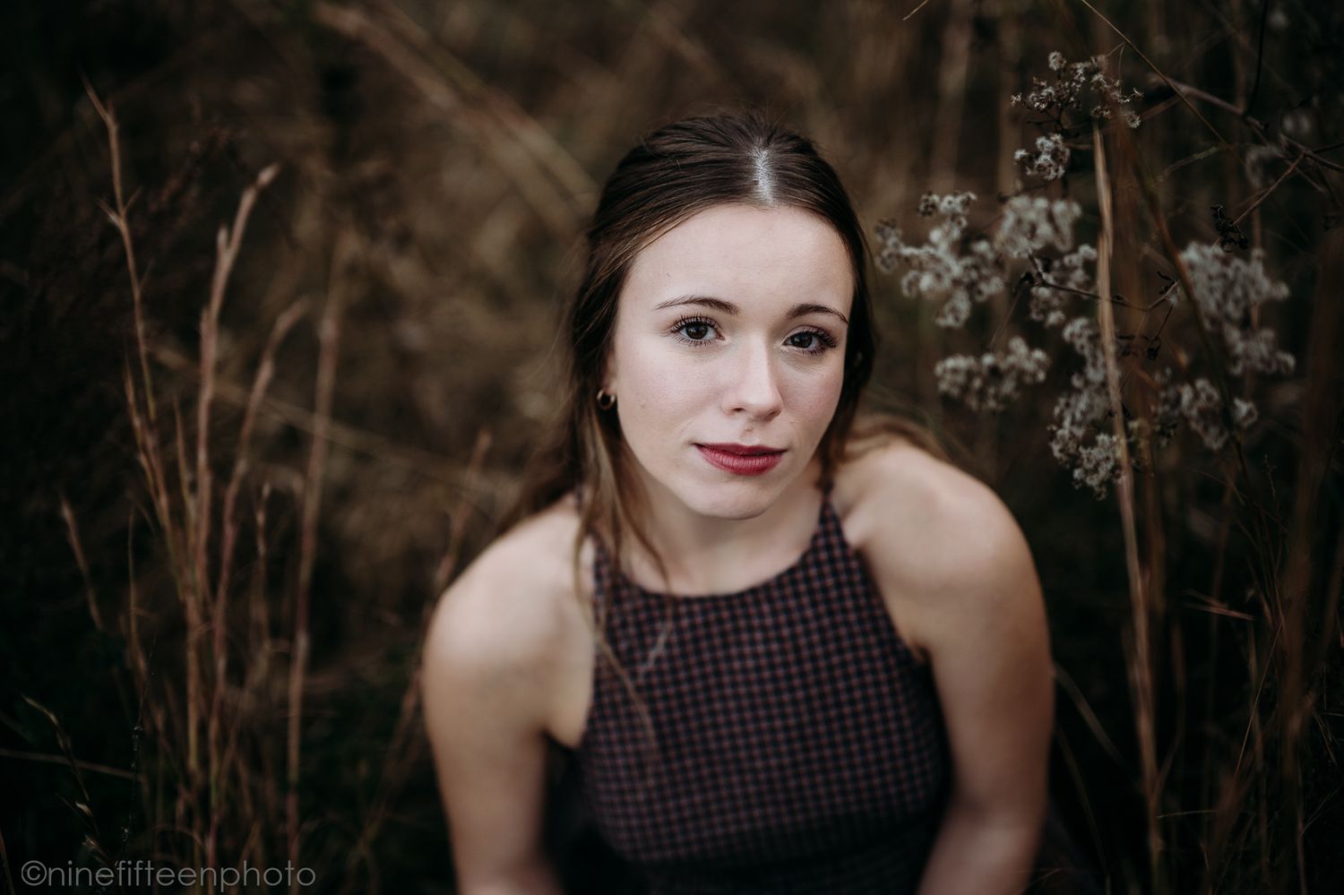 Fall senior photos of a high school girl captured by ninefifteenphoto in Brandenburg KY, featuring golden light, colorful leaves.