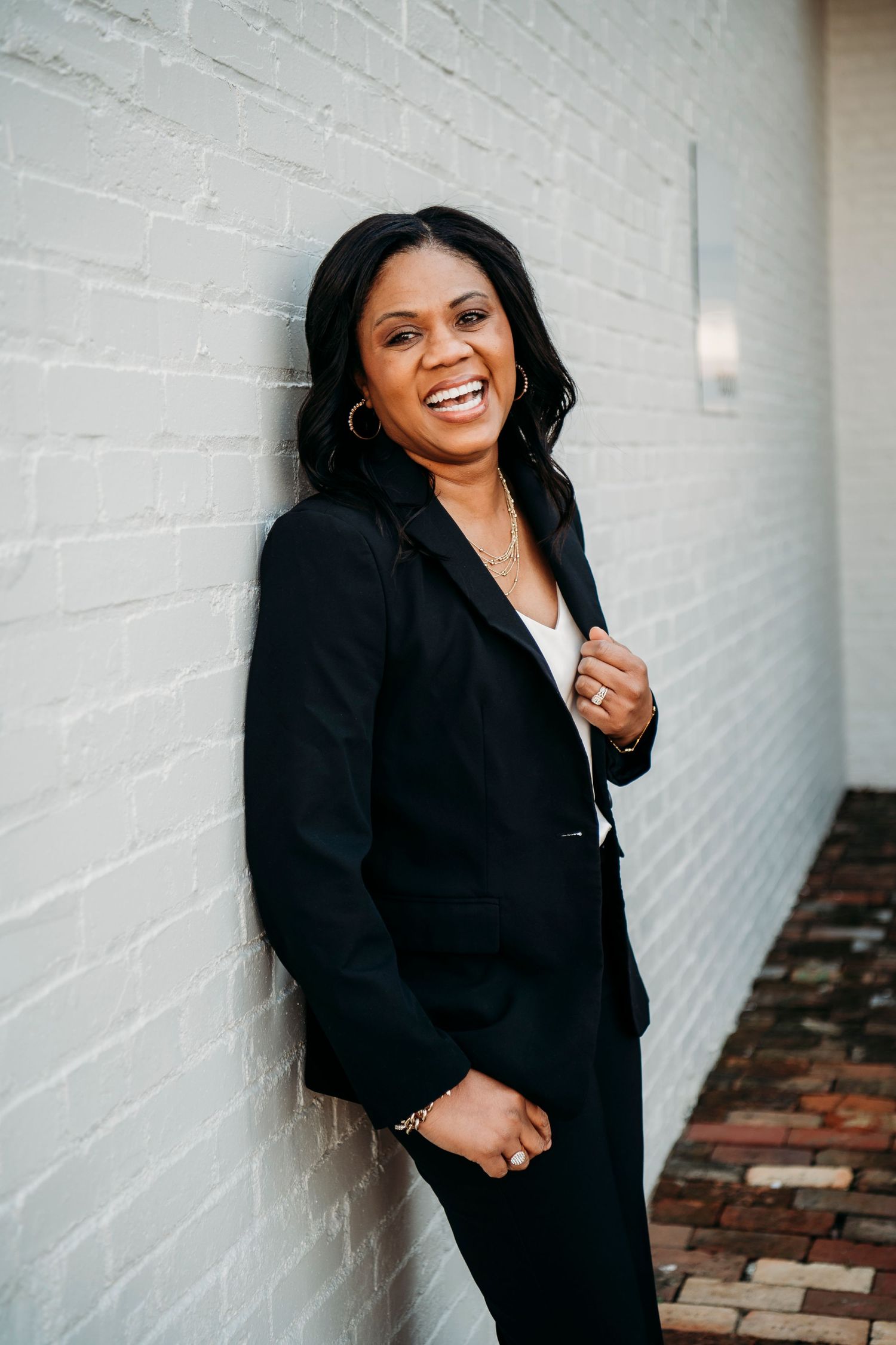 Professional headshot of a woman in a black blazer, Meade County Kentucky business portrait photographer.