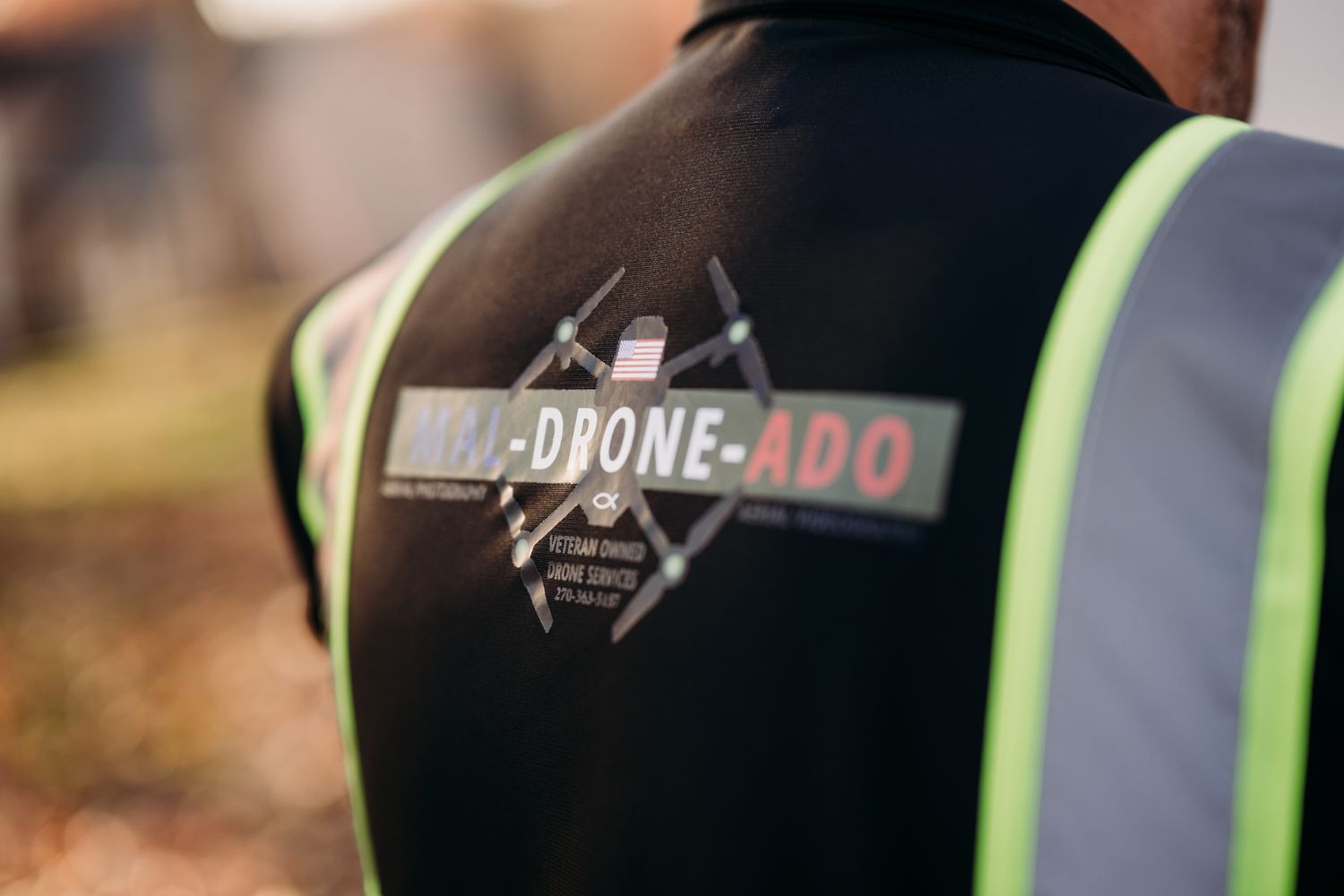 Brandenburg KY drone branding photos of José Maldonado, owner of Mal-Drone-Ado, captured by ninefifteenphoto during a real estate shoot in D