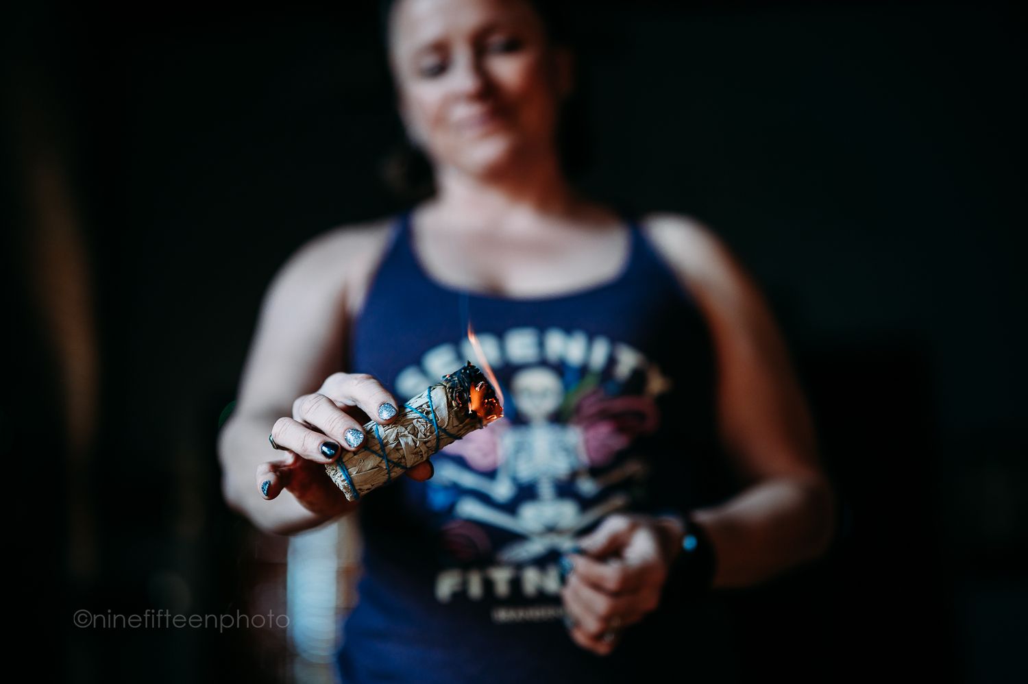 Branding portrait of yoga studio owner holding business cards, ninefifteenphoto Brandenburg KY branding photographer.