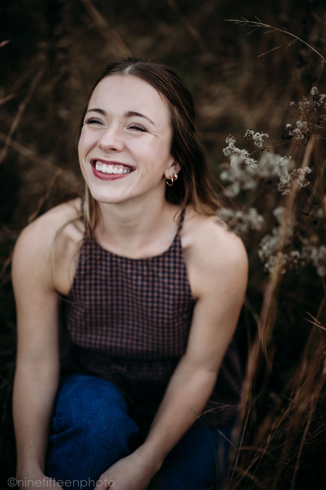 Fall senior photos of a high school girl captured by ninefifteenphoto in Brandenburg KY, featuring golden light, colorful leaves.