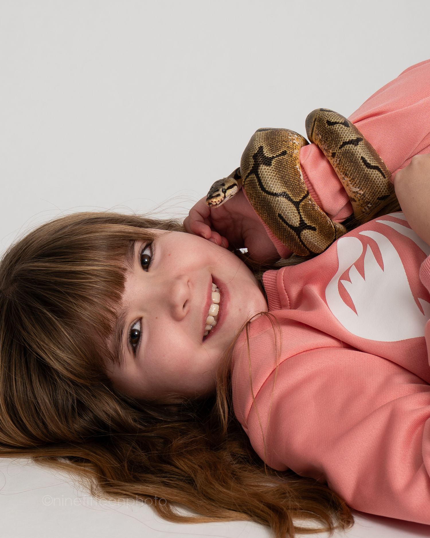 Studio child portrait holding pet lizard, ninefifteenphoto Brandenburg KY children photographer in Meade County.