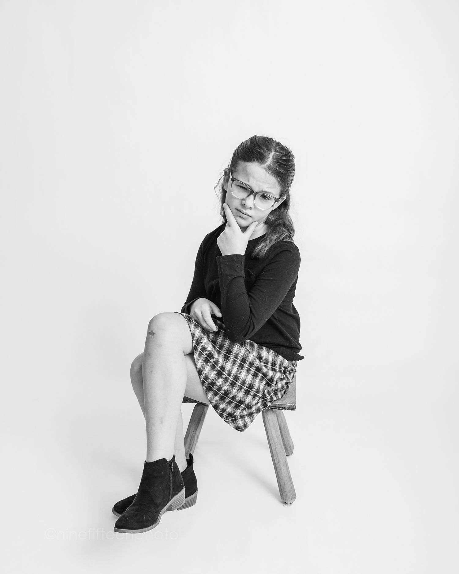 Black and white studio portrait of girl on stool, ninefifteenphoto Brandenburg KY children photographer in Meade County.