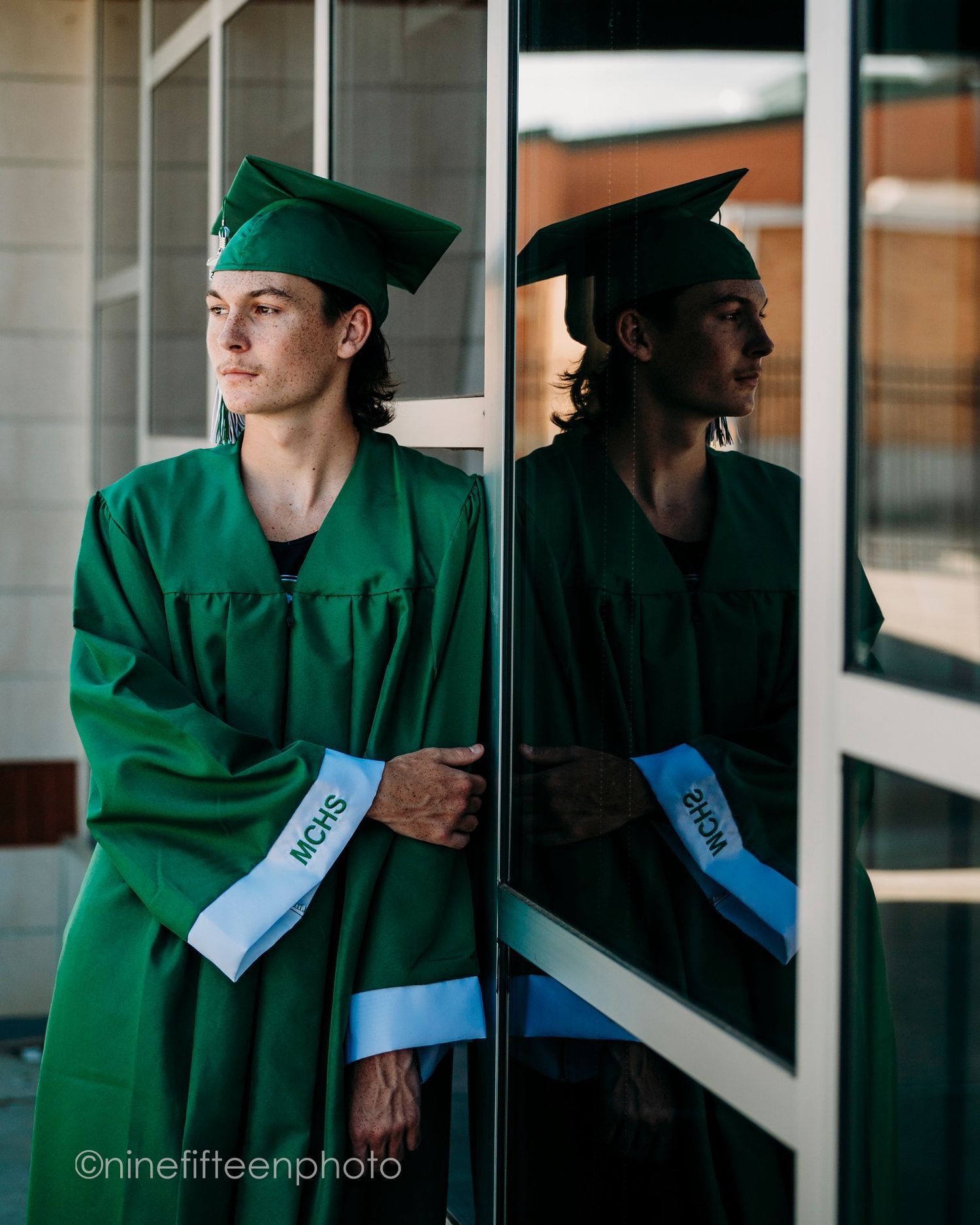 Senior graduation photo in cap and gown taken outdoors in Kentucky by ninefifteenphoto for Class of 2025.