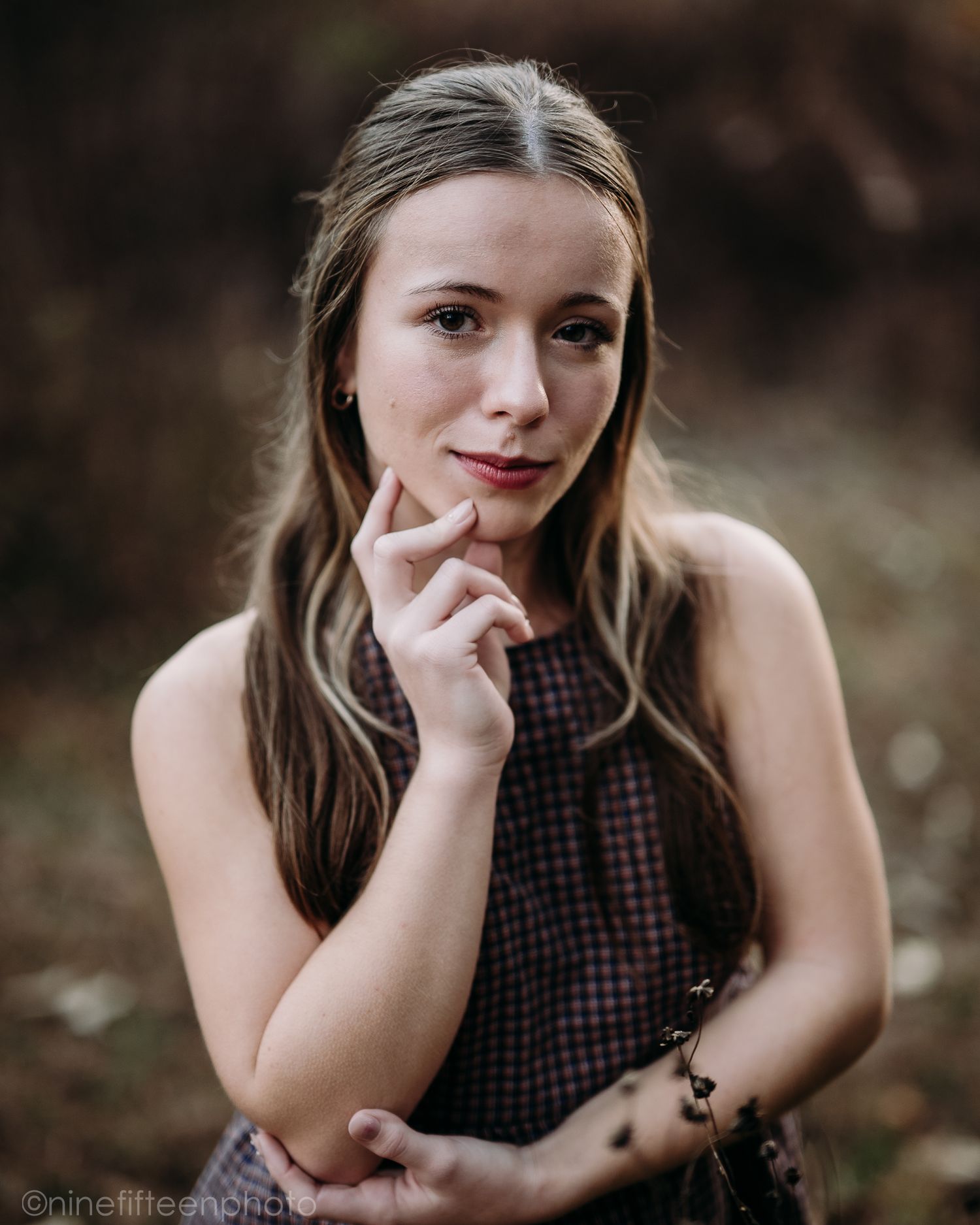 Fall senior photos of a high school girl captured by ninefifteenphoto in Brandenburg KY, featuring golden light, colorful leaves.