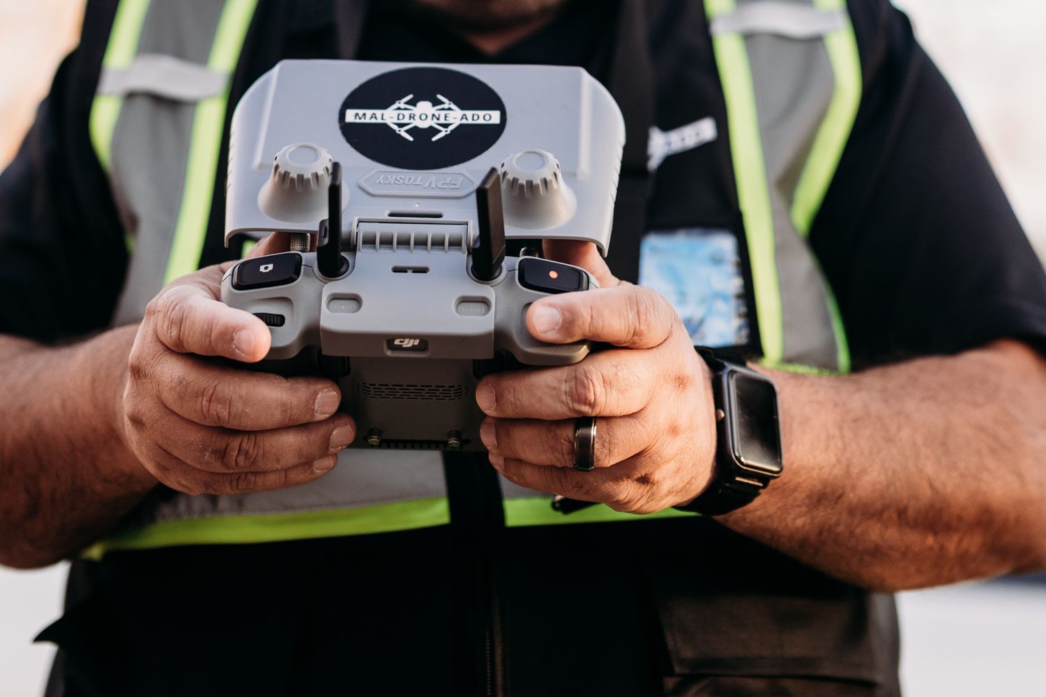 Brandenburg KY drone branding photos of José Maldonado, owner of Mal-Drone-Ado, captured by ninefifteenphoto during a real estate shoot in D