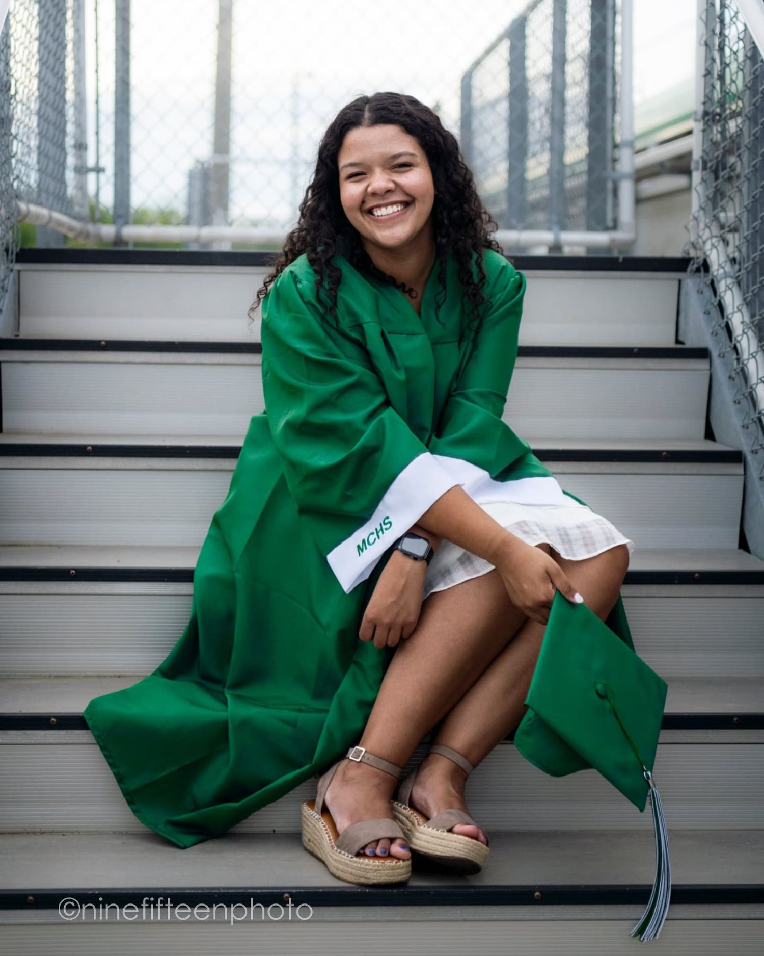 Senior graduation photo in cap and gown taken outdoors in Kentucky by ninefifteenphoto for Class of 2025.