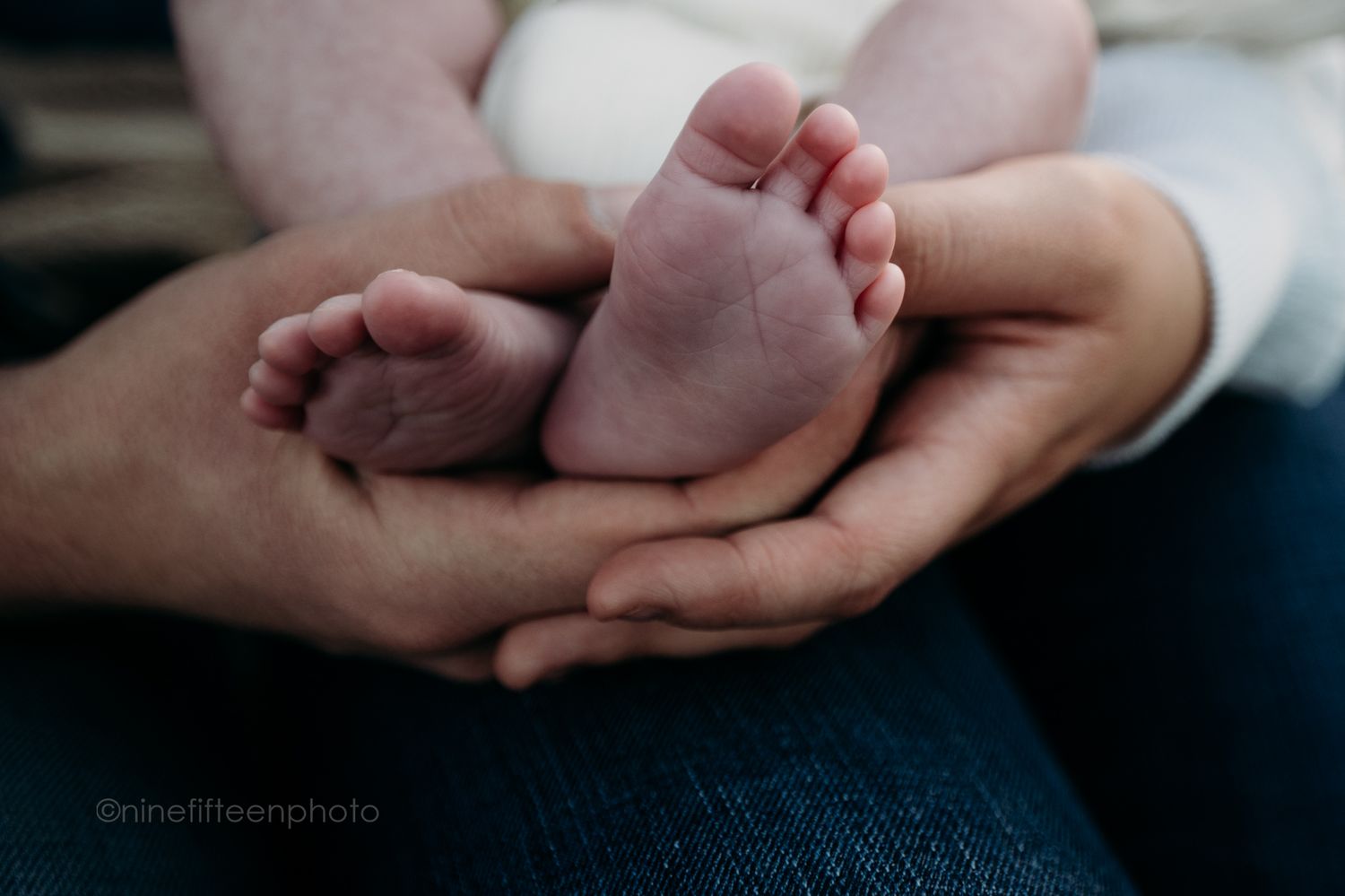Custer KY newborn lifestyle photo of Kaylin and Caleb with their baby Devin, captured by ninefifteenphoto in rustic golden light.