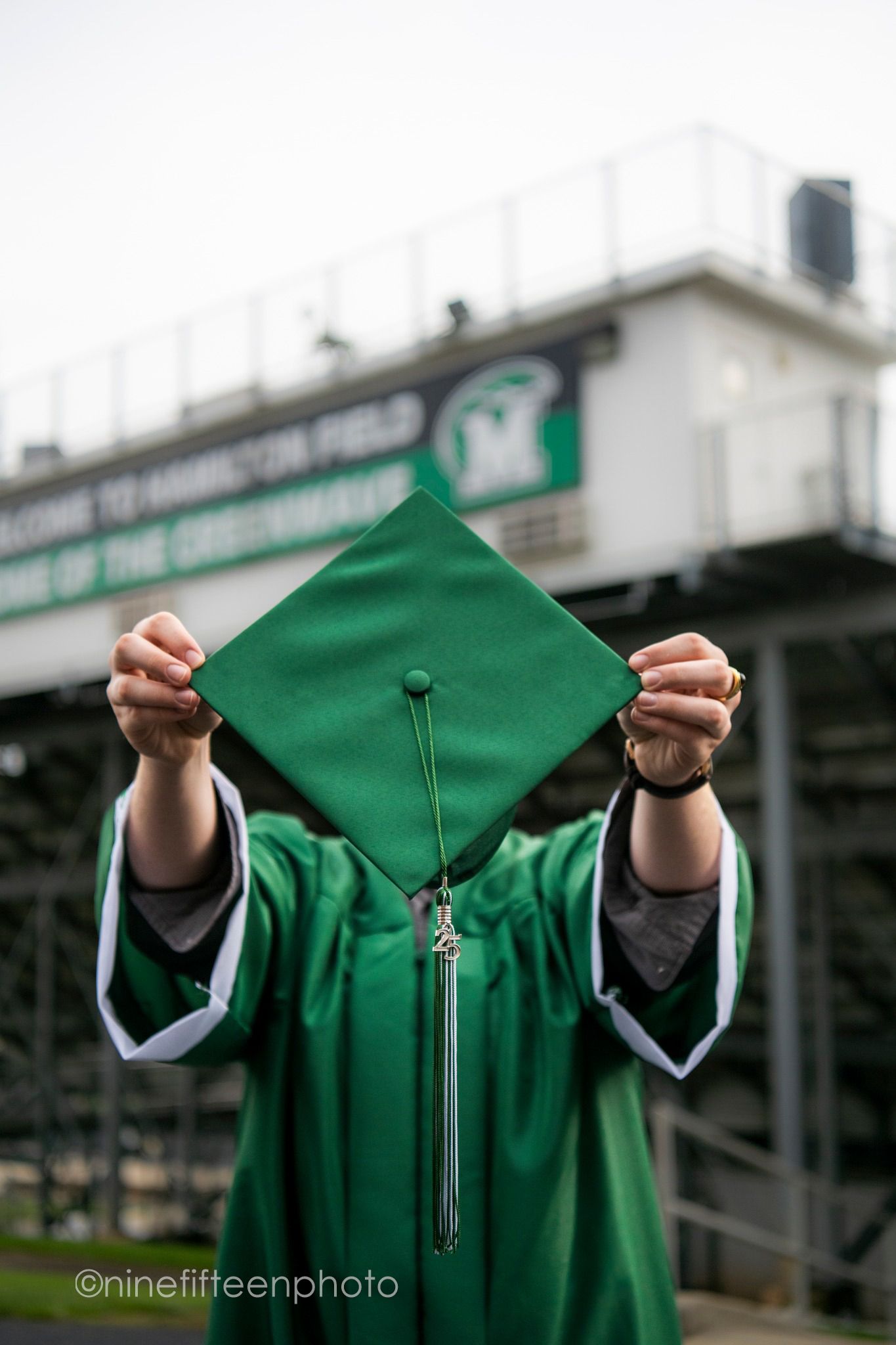 Senior graduation photo in cap and gown taken outdoors in Kentucky by ninefifteenphoto for Class of 2025.